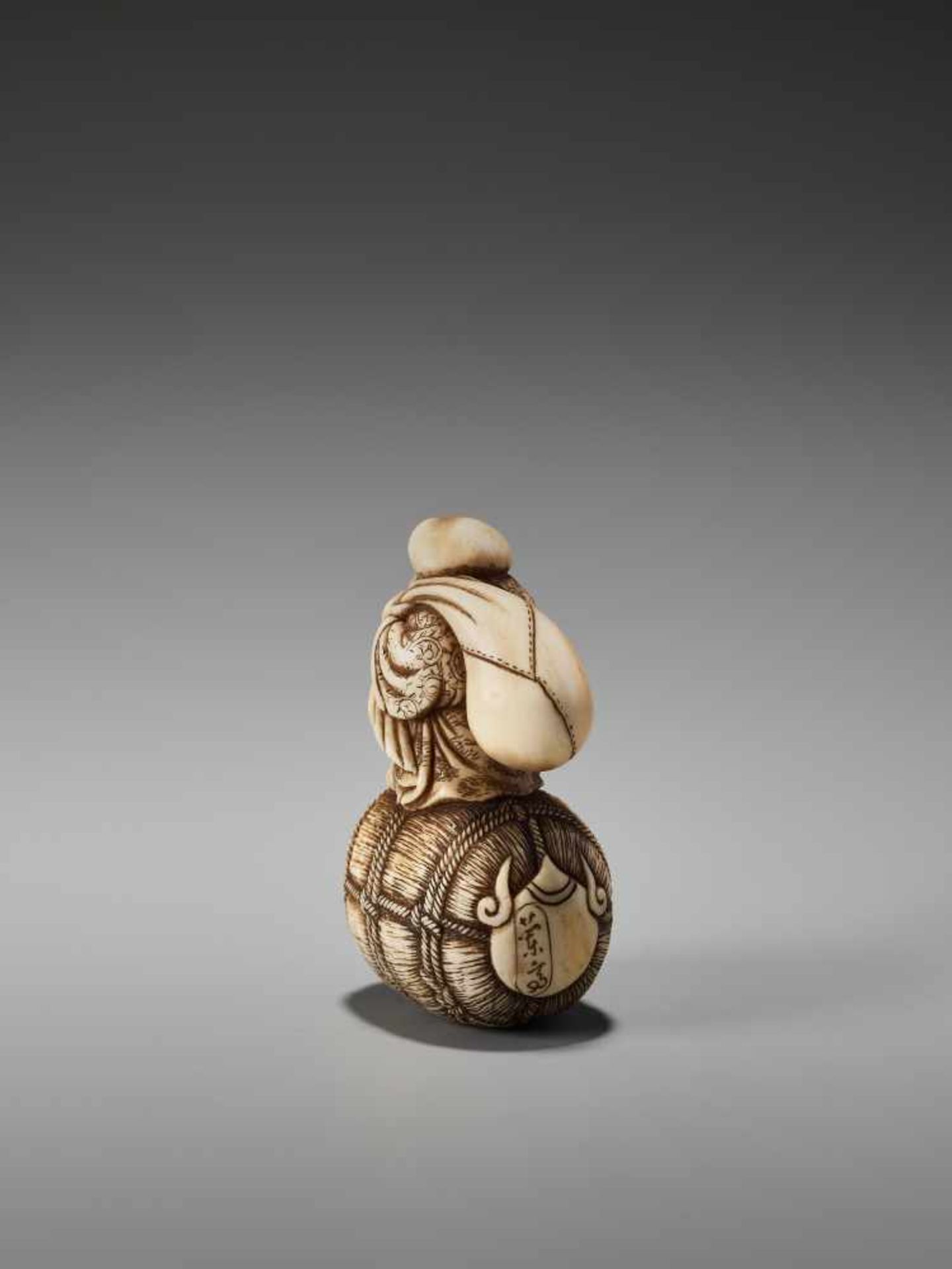 AN IVORY NETSUKE OF DAIKOKU ON A RICE BALE BY RANTEIBy Rantei, ivory netsukeJapan, Kyoto, mid-19th - Image 4 of 8