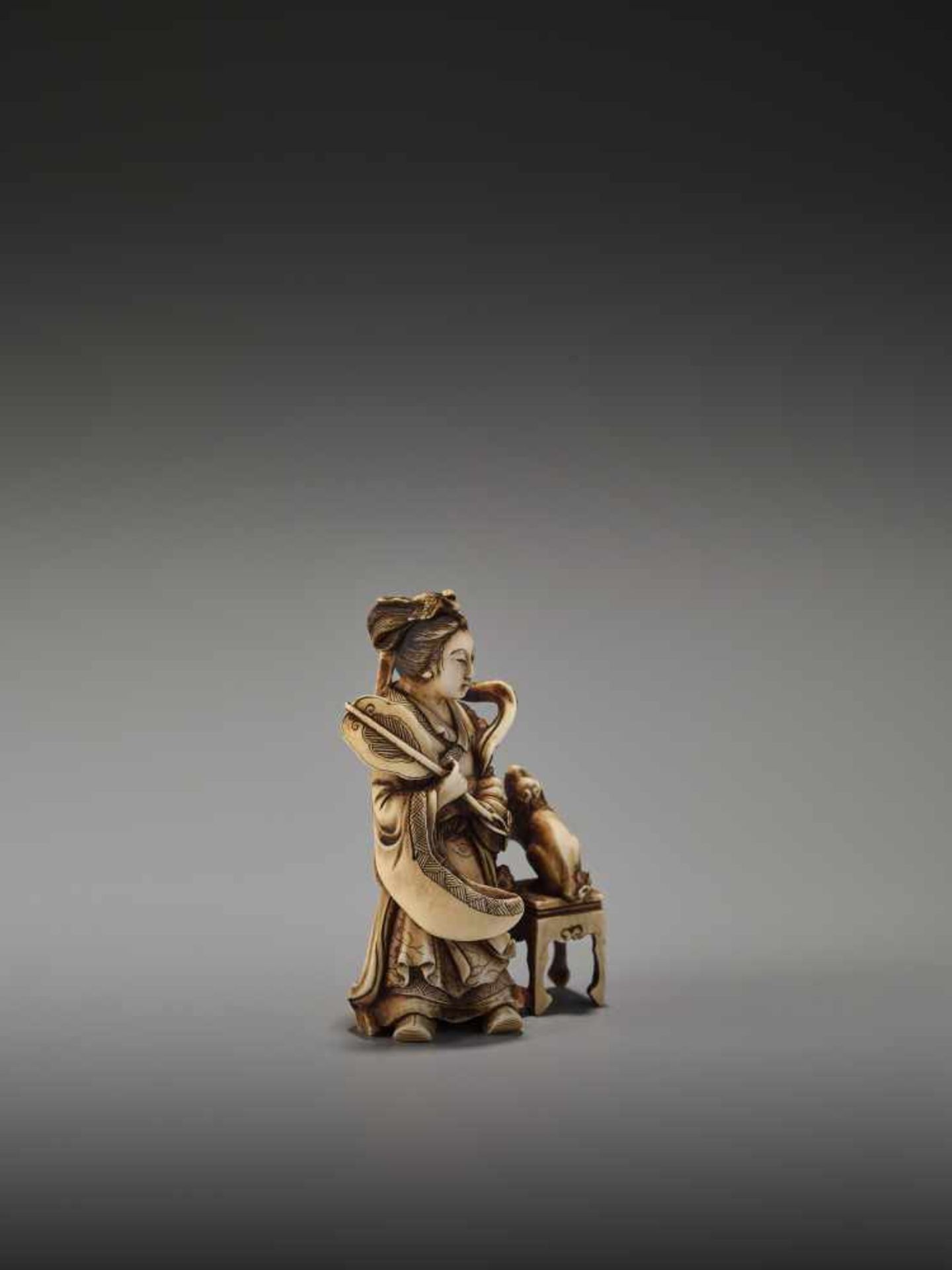 A FINE NETSUKE OKIMONO OF A CHINESE IMMORTAL WITH MYTHICAL DOG BY TEIMINBy Teimin, ivory okimono- - Image 6 of 9