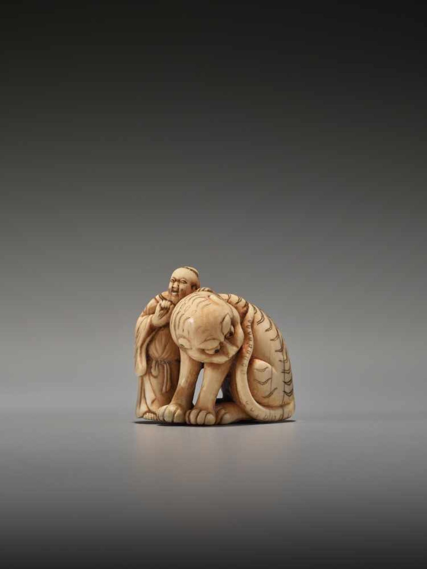 A RARE IVORY NETSUKE DEPICTING SENNIN BUKAN ZENSHIUnsigned, ivory netsukeJapan, 19th century, Edo