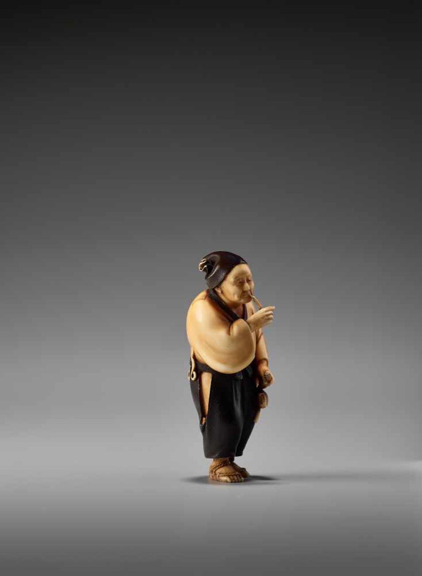 A SO SCHOOL IVORY NETSUKE OF A MAN SMOKING A PIPE BY SOSAIBy Sosai, ivory netsuke with lacquerJapan, - Image 5 of 11