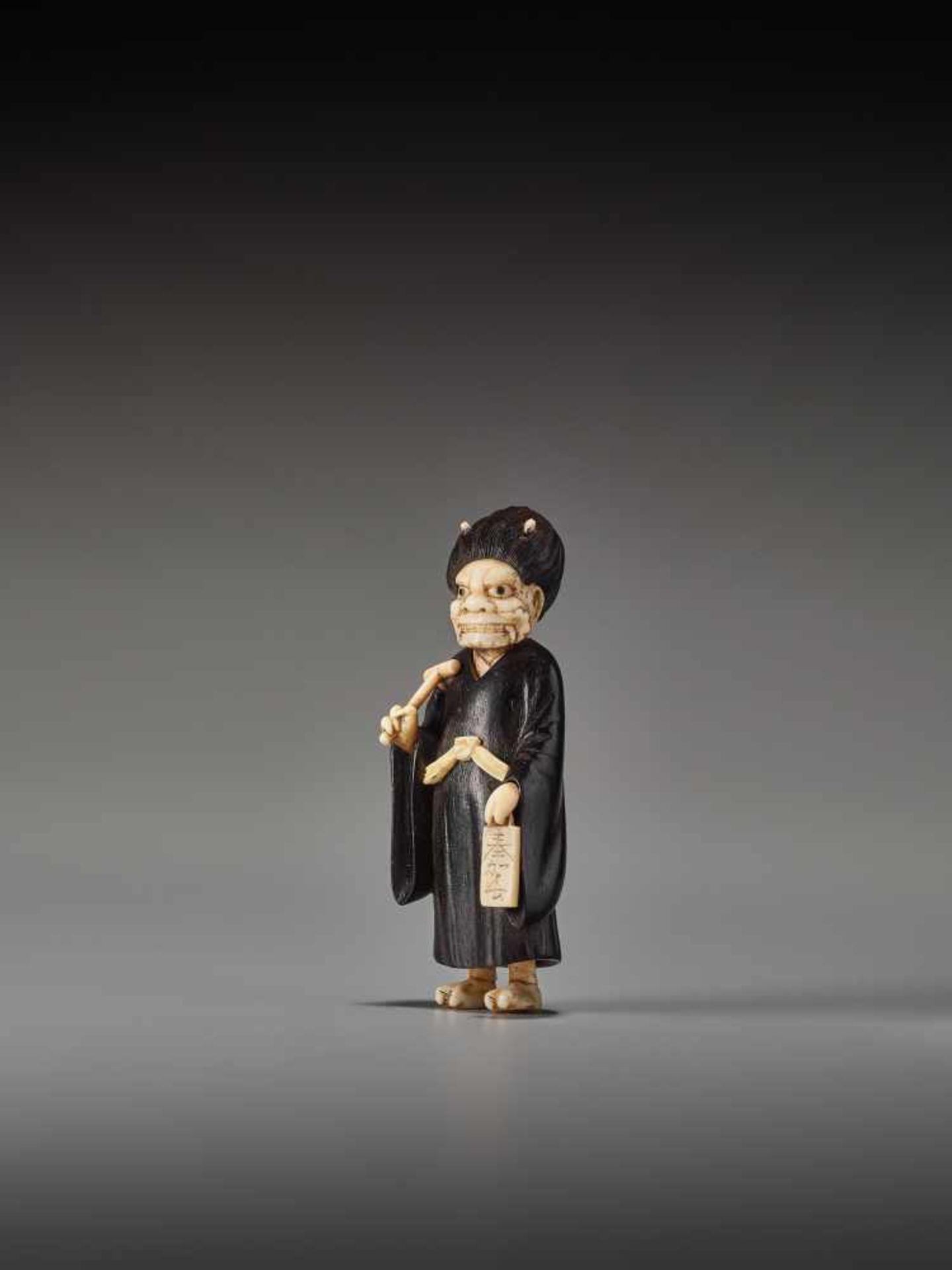 A RARE TOKYO SCHOOL EBONY AND IVORY NETSUKE OF ONI NEMBUTSU BY SADAYUKIBy Sadayuki, ebony wood and - Image 2 of 9