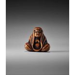 A WOOD NETSUKE OF A MEDITATING DARUMAUnsigned, wood netsukeJapan, 19th century, Edo period (1615-