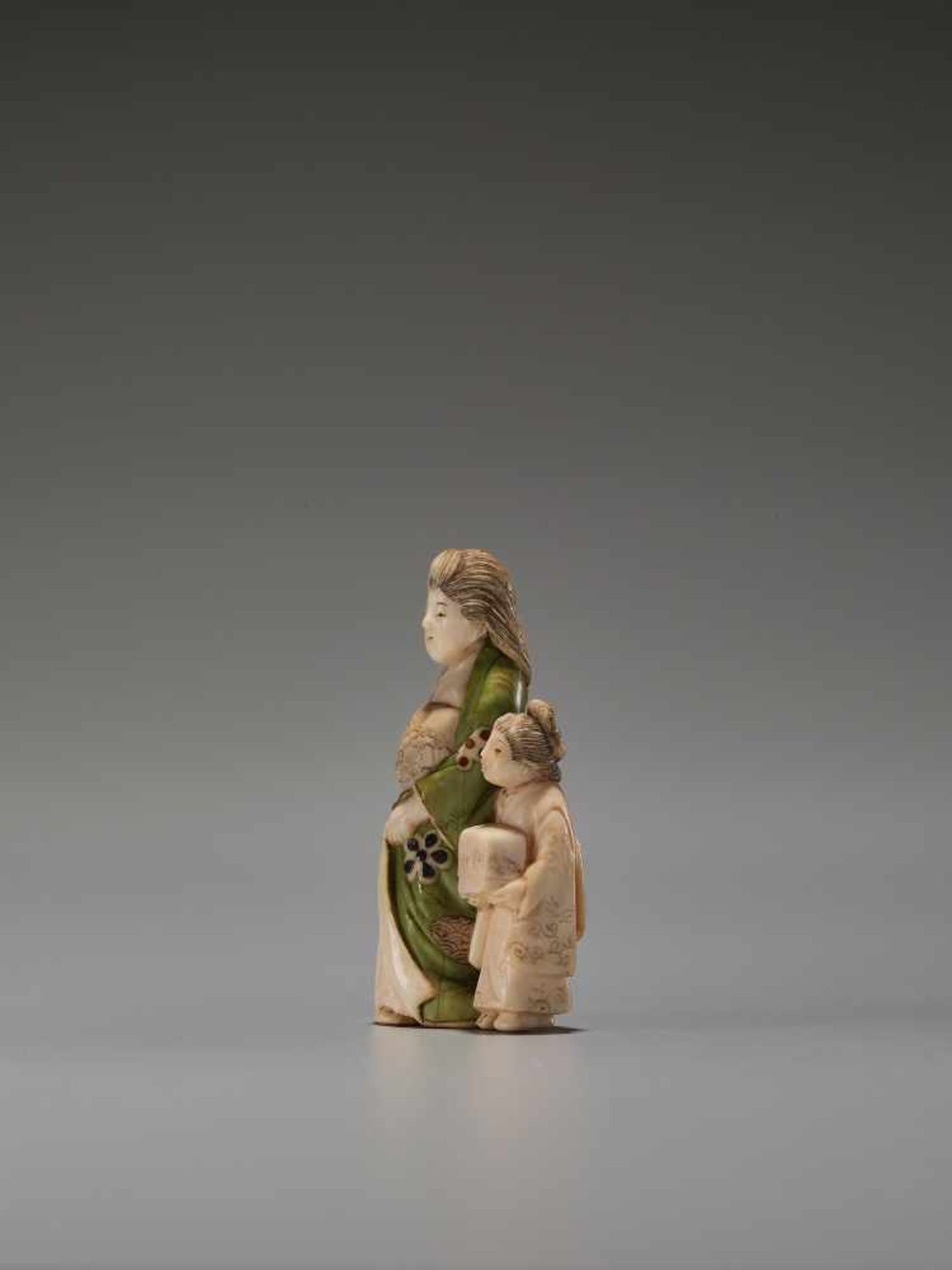 A TOKYO-SCHOOL IVORY NETSUKE OF AN OIRAN WITH A KAMURO BY GYOKUZANBy Gyokuzan, ivory netsuke with - Image 3 of 6