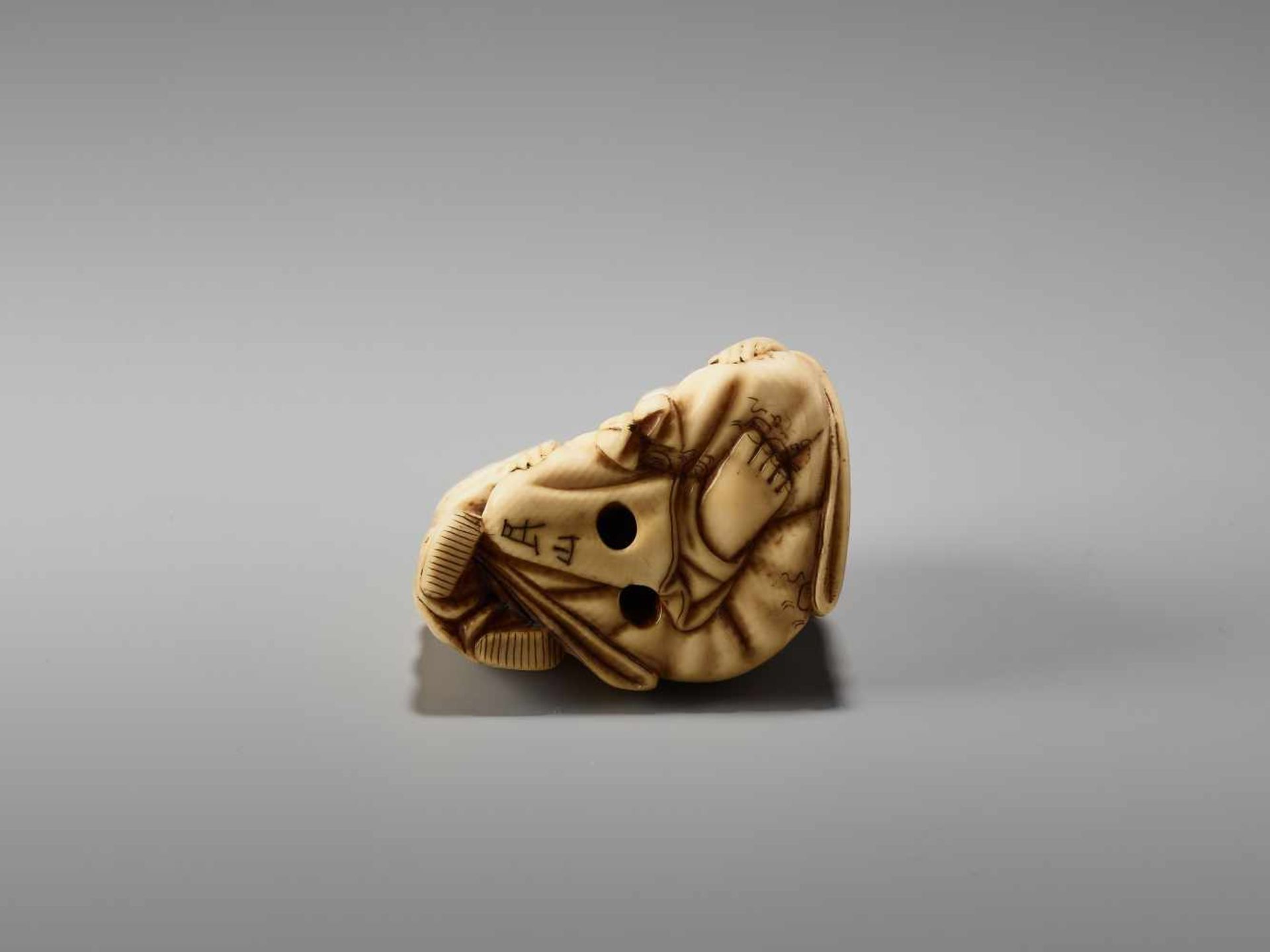 AN IVORY NETSUKE OF HOTEI PLAYING KAMIFUKI AND A KARAKO BY MINZANBy Minzan, ivory netsukeJapan, - Image 6 of 7