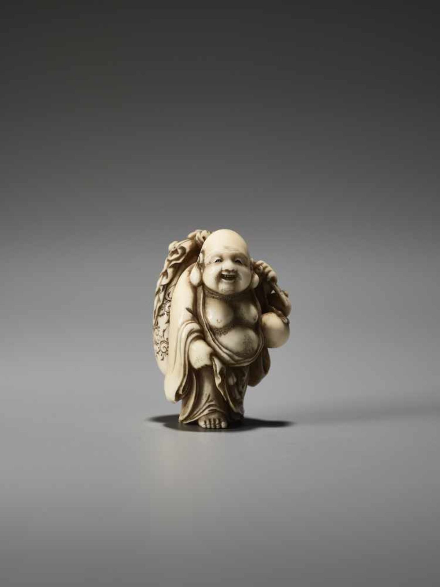 A FINE IVORY NETSUKE OF HOTEI BY MEIKEISAI HOJITSUBy Meikeisai Hojitsu, ivory netsukeJapan, Tokyo, - Image 2 of 9