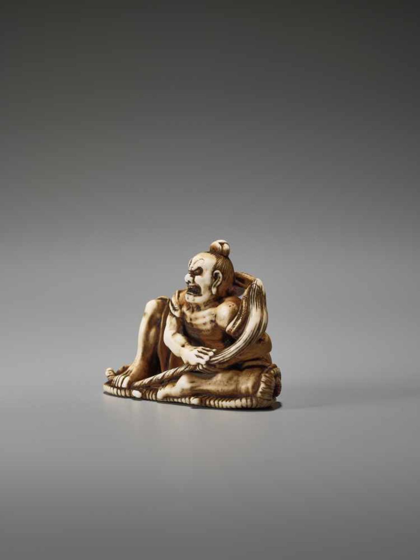 AN IVORY NETSUKE OF A POWERFUL NIO ON A SANDAL BY TOMOMASABy Tomomasa, ivory netsukeJapan, Edo, - Image 3 of 9