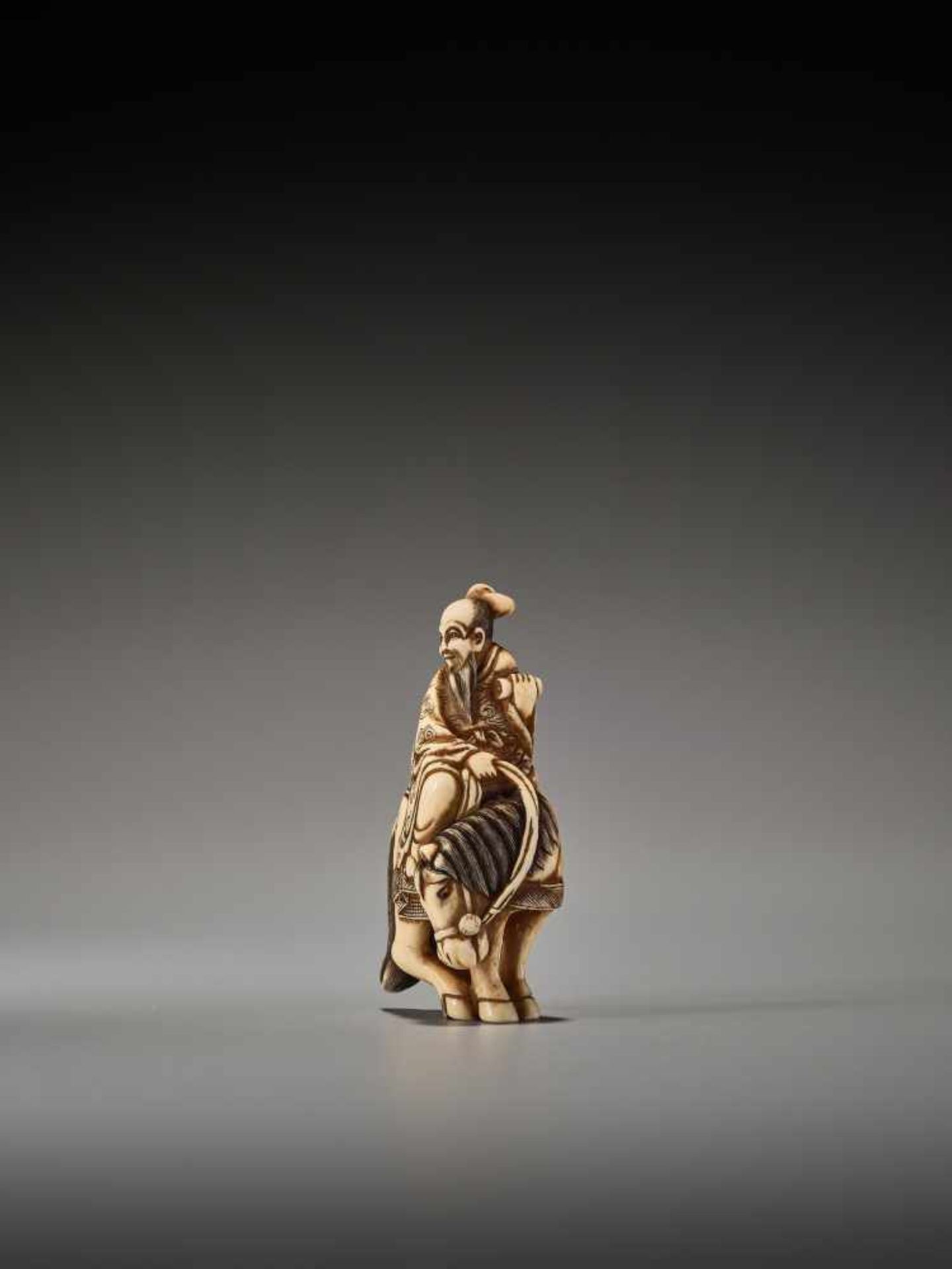 AN IVORY NETSUKE OF A TAOIST IMMORTAL ON HORSEBACK SIGNED MASANAOSigned Masanao, ivory netsukeJapan, - Image 2 of 7