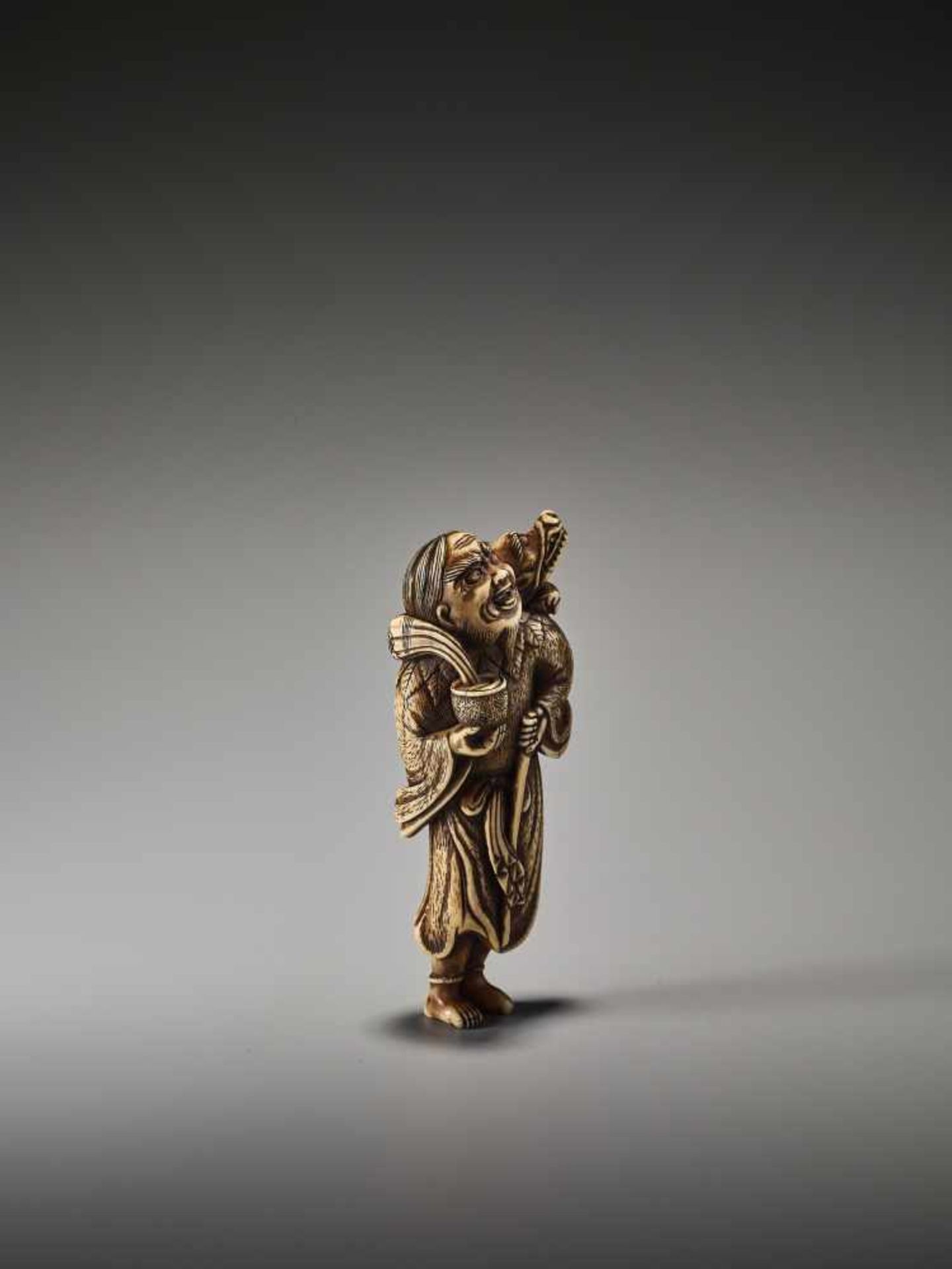 A POWERFUL TALL IVORY NETSUKE OF CHINNAN SENNIN WITH DRAGON AND TAMING STICKUnsigned, ivory - Image 6 of 6