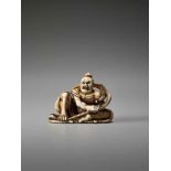 AN IVORY NETSUKE OF A POWERFUL NIO ON A SANDAL BY TOMOMASABy Tomomasa, ivory netsukeJapan, Edo,