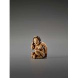 AN IVORY SHUNGA NETSUKE OF A NUDE WOMAN WASHING HERSELF BY THE TOMOCHIKA SCHOOLBy Tomochika, ivory