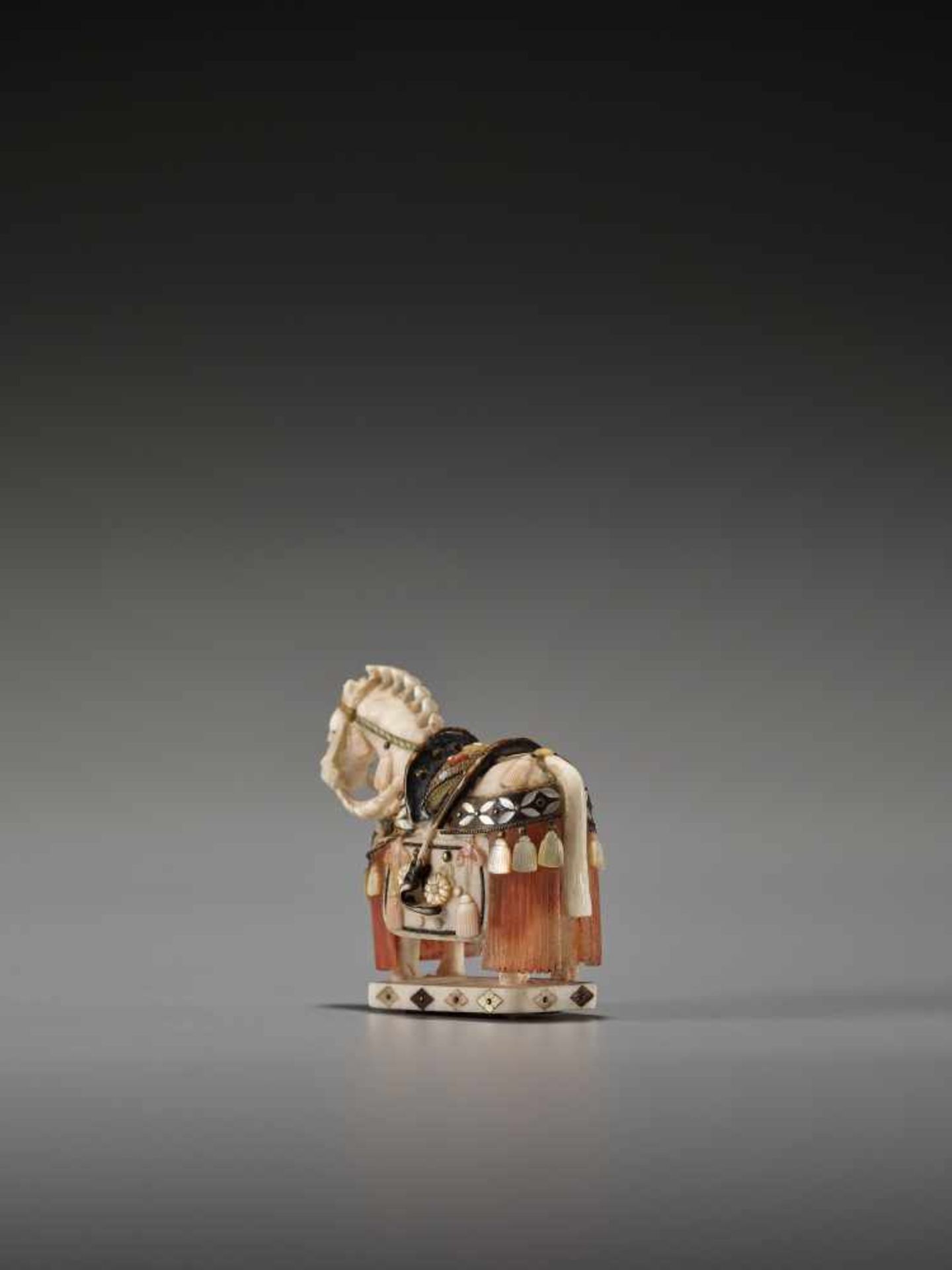 A SHIBAYAMA STYLE INLAID IVORY NETSUKE OF A CAPARISONED HORSE BY KAZUAKIBy Kazuaki, ivory netsuke - Image 5 of 8