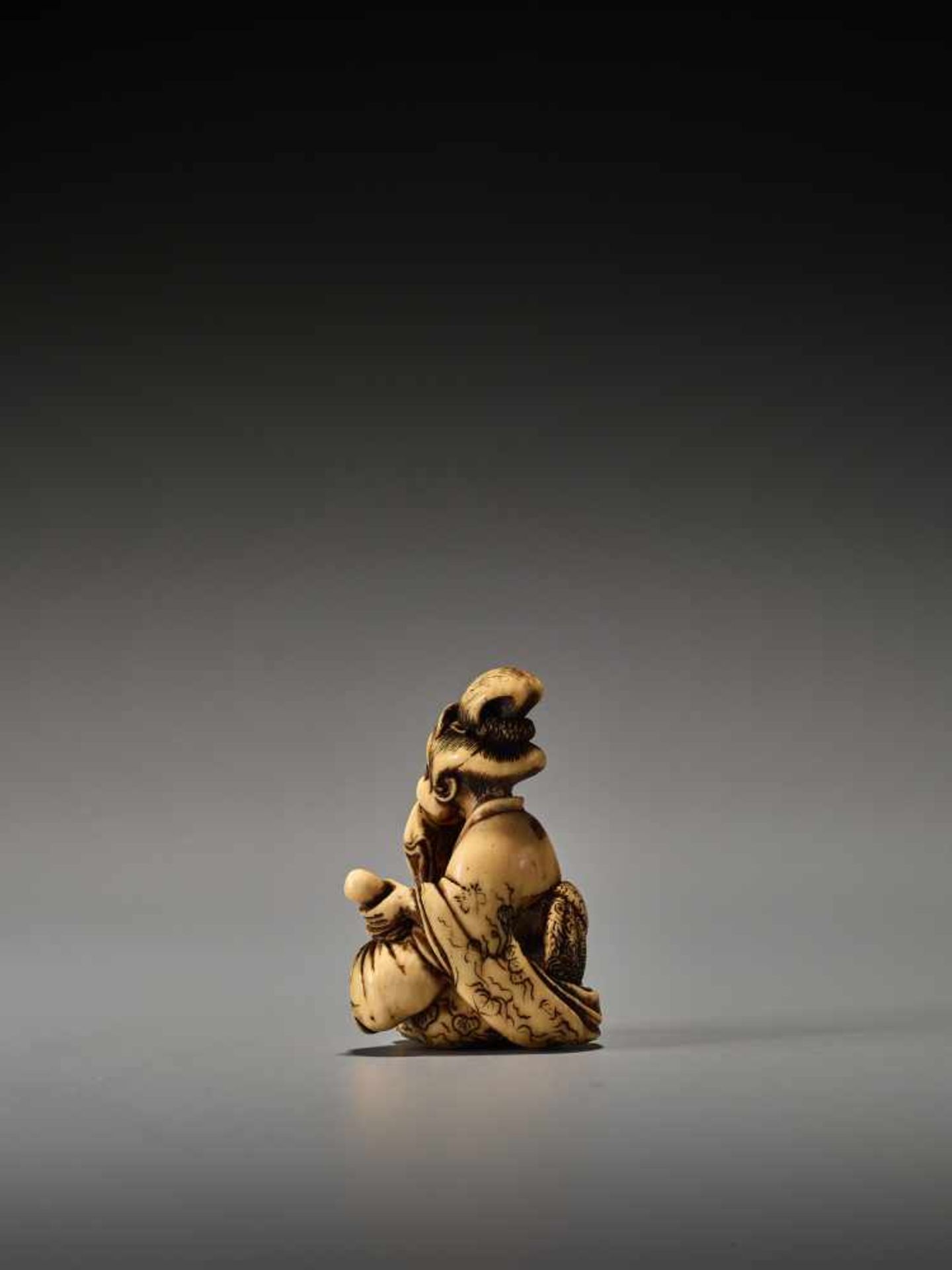 A RARE IVORY SHUNGA NETSUKE OF OKAME WITH TENGU MASK BY SHUOSAI HIDEMASABy Shuosai (Hidemasa), ivory - Image 4 of 9