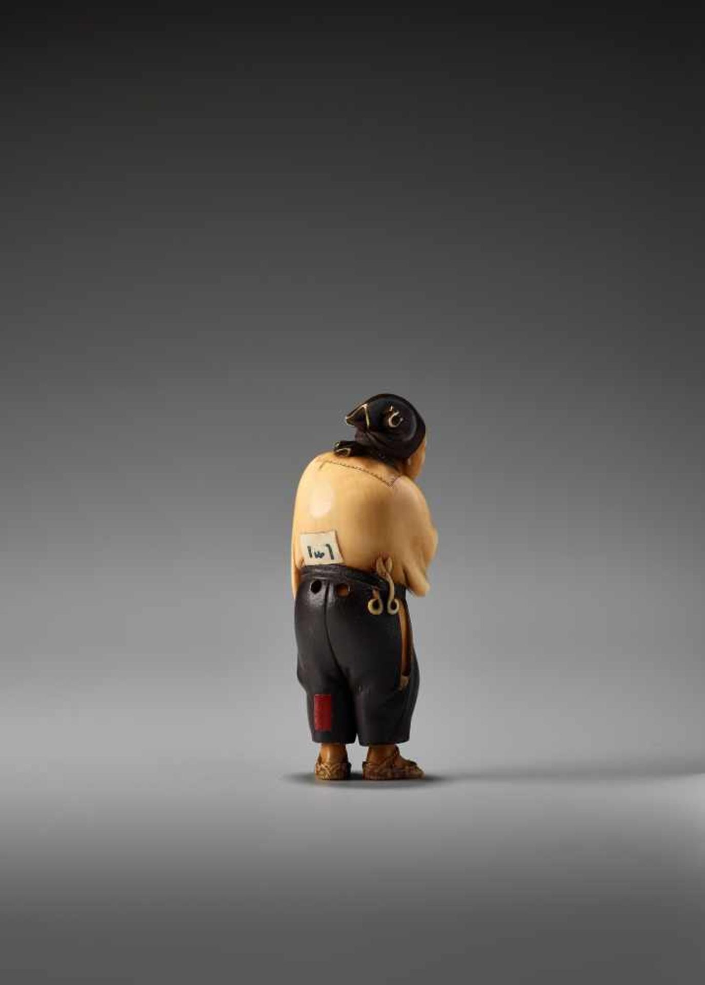 A SO SCHOOL IVORY NETSUKE OF A MAN SMOKING A PIPE BY SOSAIBy Sosai, ivory netsuke with lacquerJapan, - Image 3 of 11