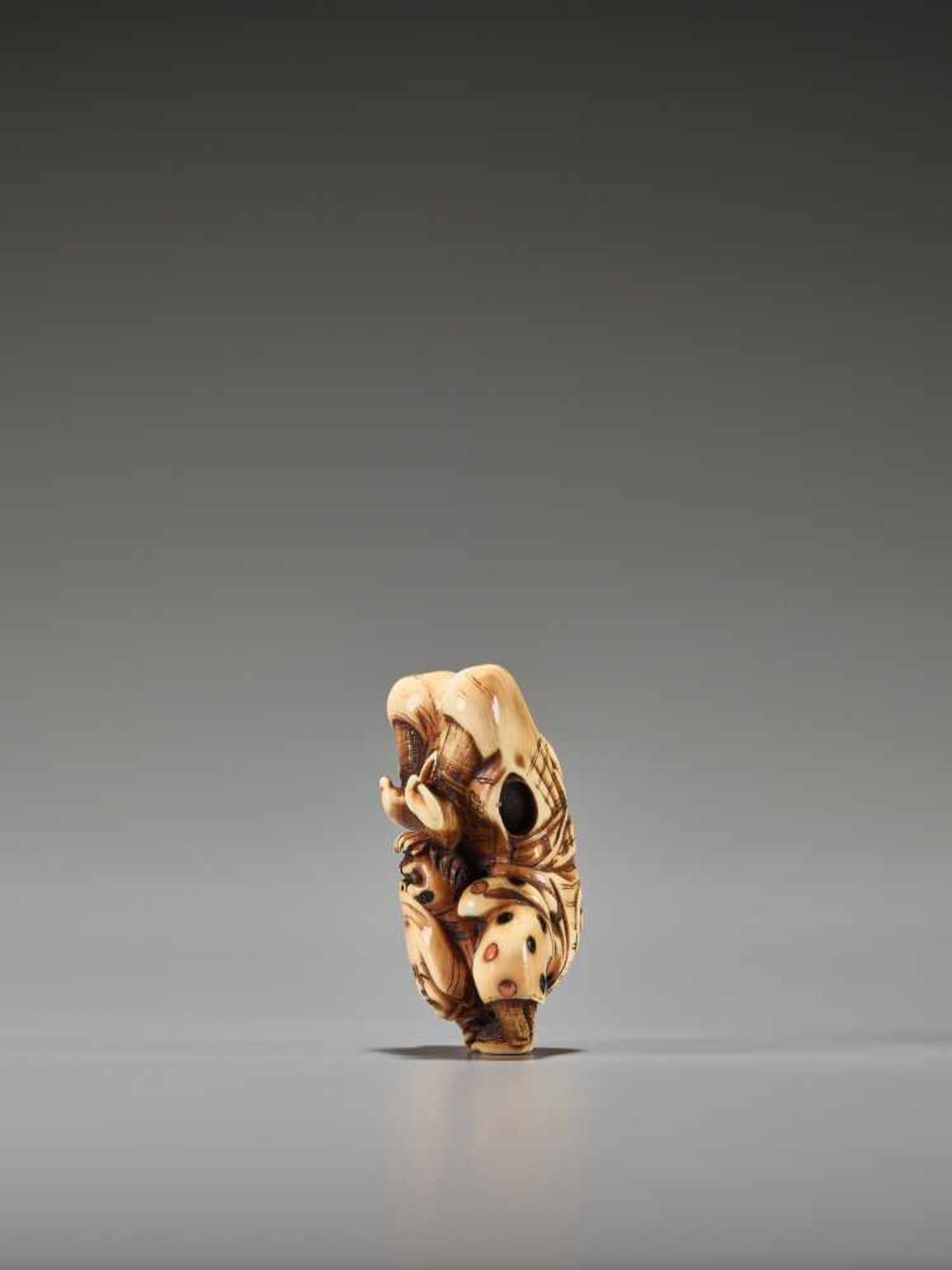 A FINE INLAID IVORY NETSUKE DEPICTING AN ACROBATUnsigned, ivory netsuke with inlaysJapan, probably - Image 3 of 7