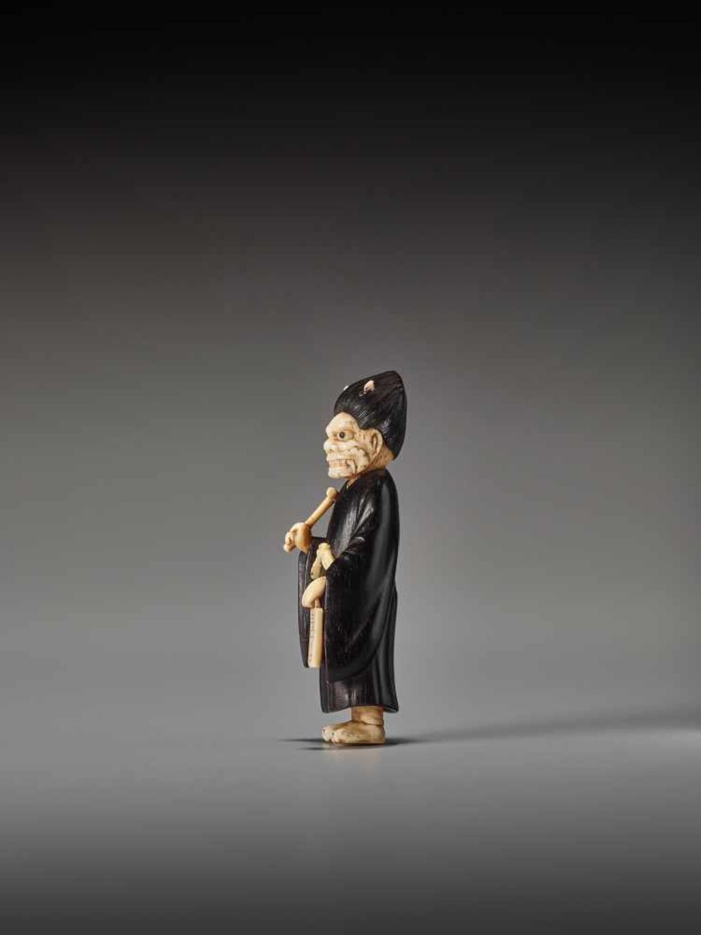 A RARE TOKYO SCHOOL EBONY AND IVORY NETSUKE OF ONI NEMBUTSU BY SADAYUKIBy Sadayuki, ebony wood and - Image 3 of 9