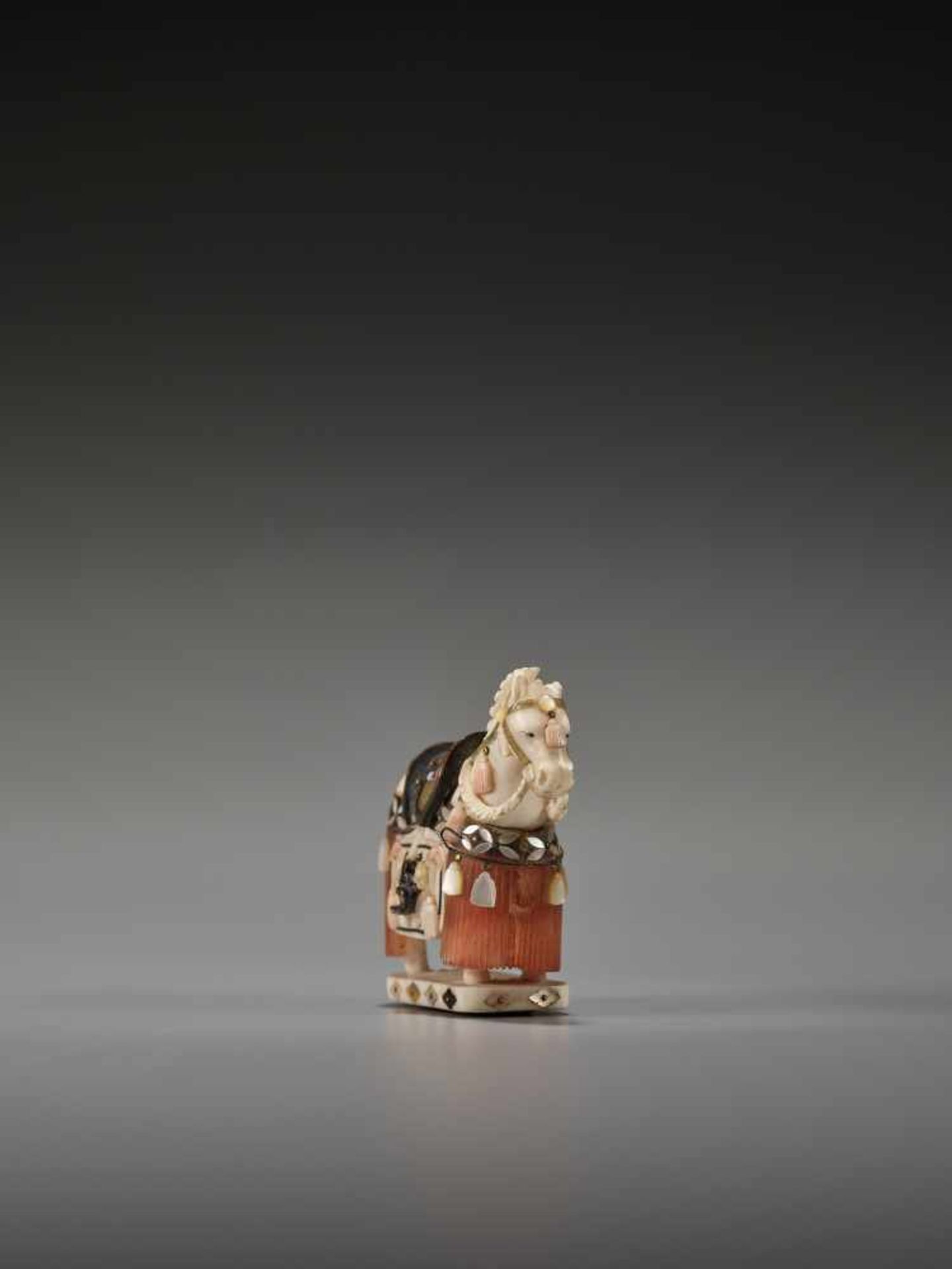 A SHIBAYAMA STYLE INLAID IVORY NETSUKE OF A CAPARISONED HORSE BY KAZUAKIBy Kazuaki, ivory netsuke - Image 3 of 8