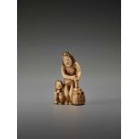 A RARE IVORY SHUNGA NETSUKE WITH BIJIN, BOY AND OCTOPUSUnsigned, ivory shunga netsukeJapan, Tokyo,