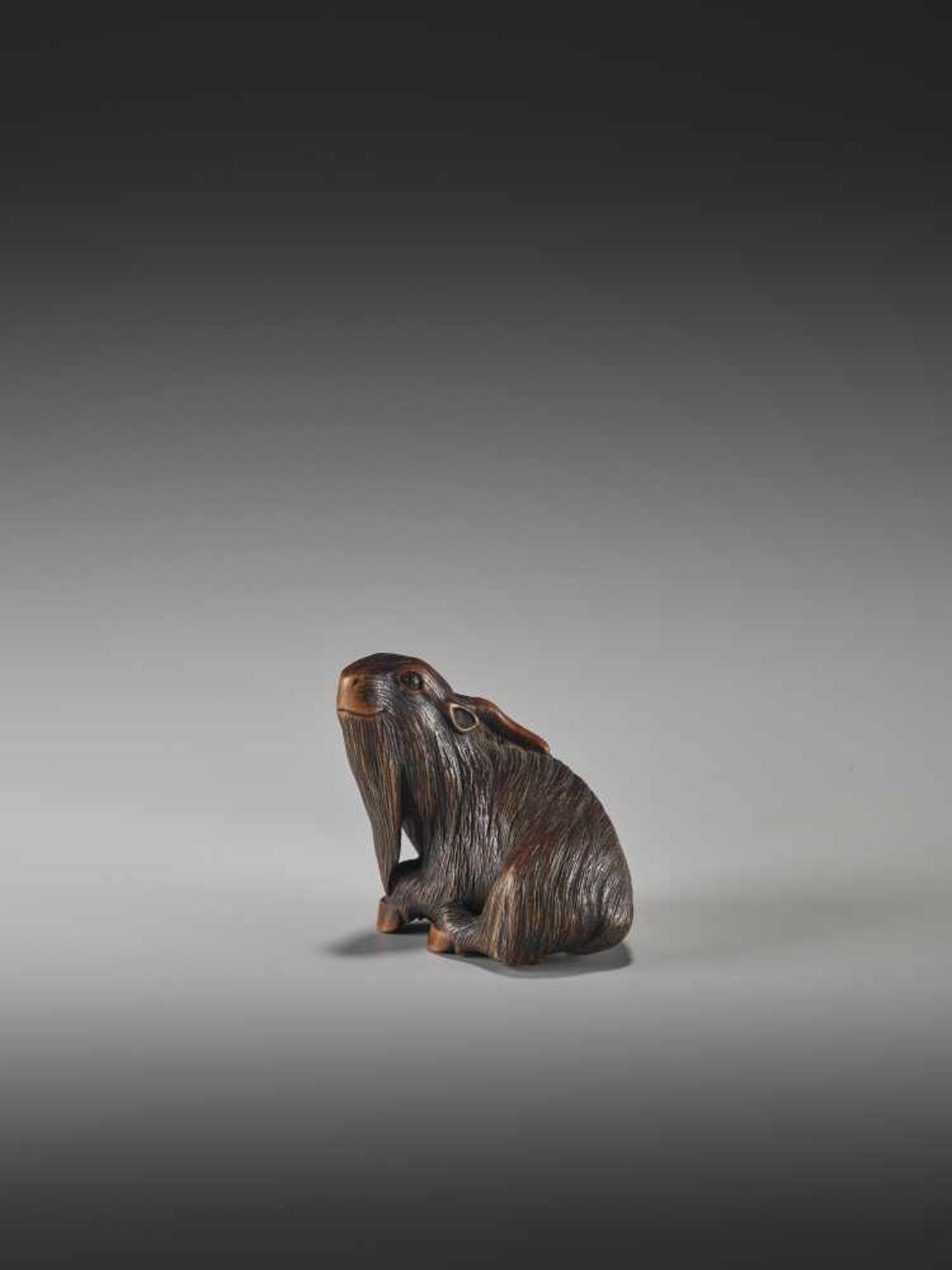 A WOOD NETSUKE OF A GOAT BY MASANAOBy Masanao, wood netsukeJapan, Ise-Yamada, 19th century, Edo