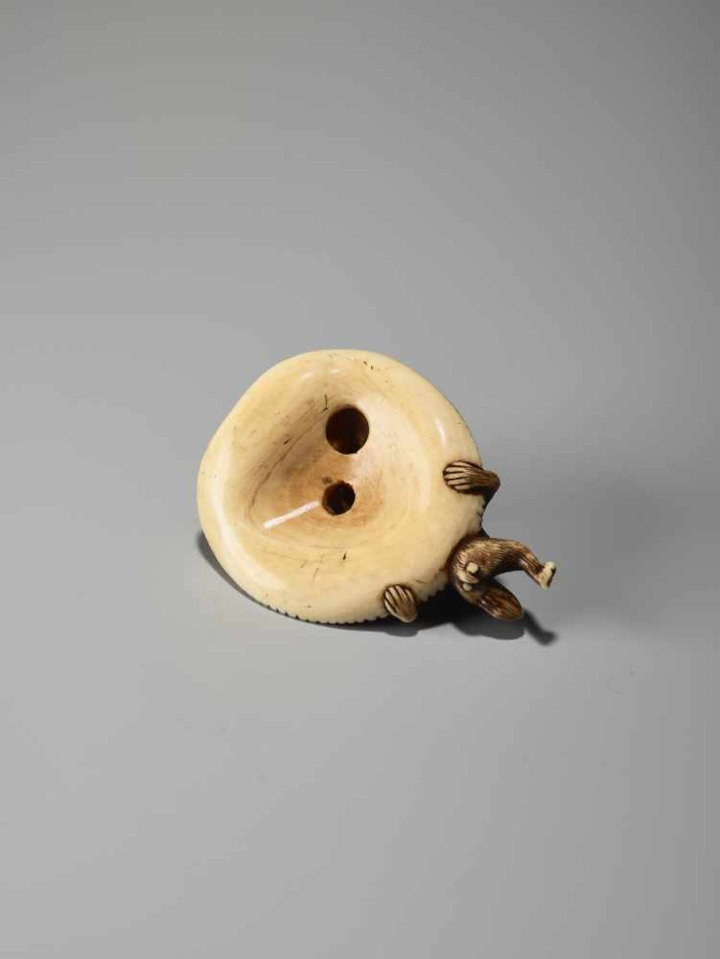 AN AMUSING IVORY NETSUKE OF A SMALL MONKEY CARRYING A LARGE MUSHROOMUnsigned, ivory netsukeJapan, - Image 9 of 9