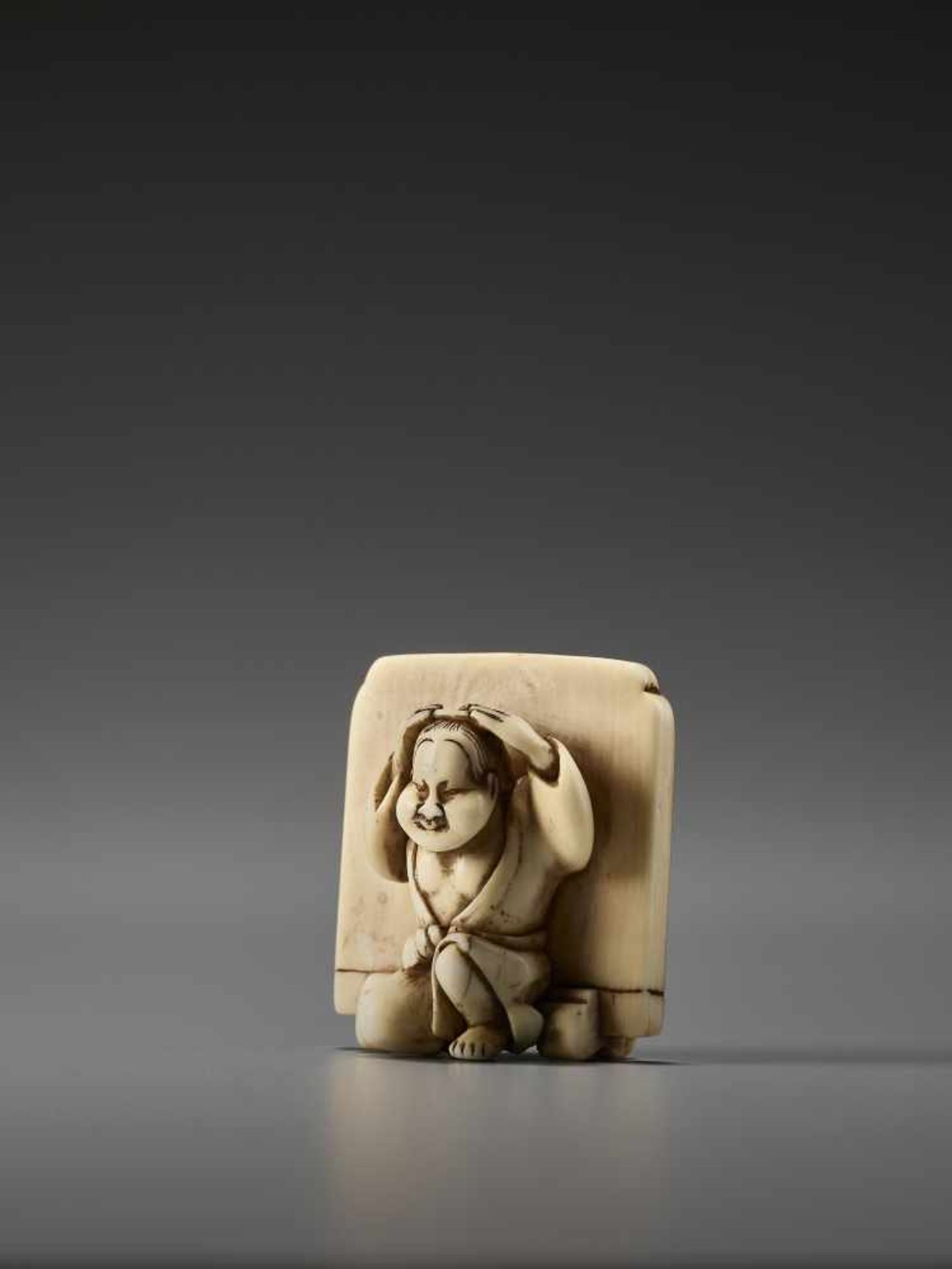 AN IVORY NETSUKE OF OKAME IN FRONT OF A SCREEN BY HIDEMASABy Hidemasa, ivory netsukeJapan, Osaka, - Image 2 of 8