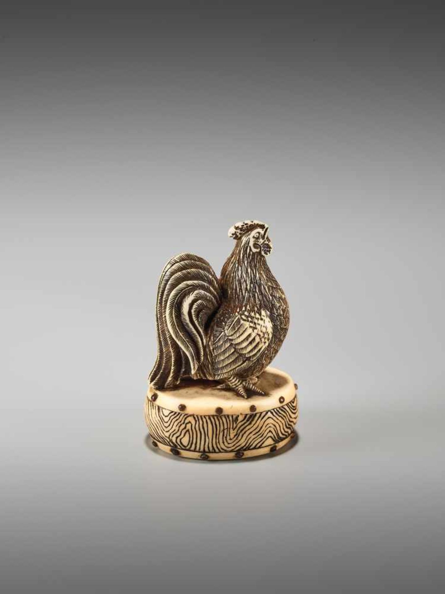 A FINE NETSUKE OF A COCKEREL ON A DRUM BY KOJITSU By Kojitsu, ivory netsuke with horn inlayJapan, - Image 5 of 12