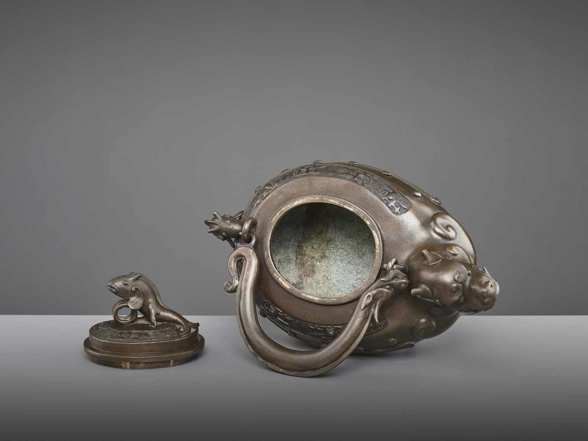 A BRONZE DRAGON EWER, QING China, 18th - 19th century. The lidded tripod vessel with a dragon head - Image 7 of 9