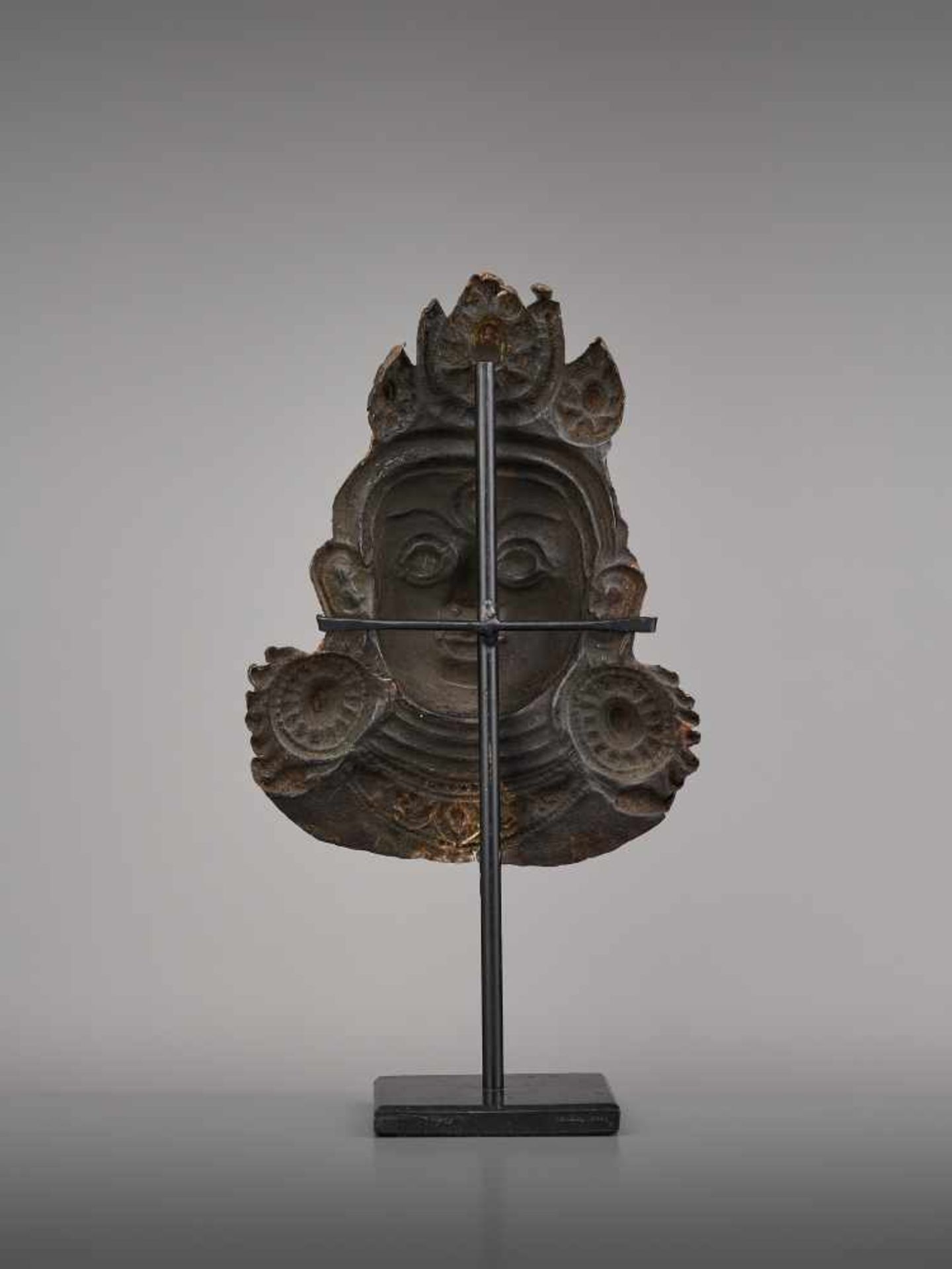 A COPPER REPOUSSE MASK OF BHAIRAVA Nepal, 17th century. The expressive copper mask with well- - Image 6 of 6