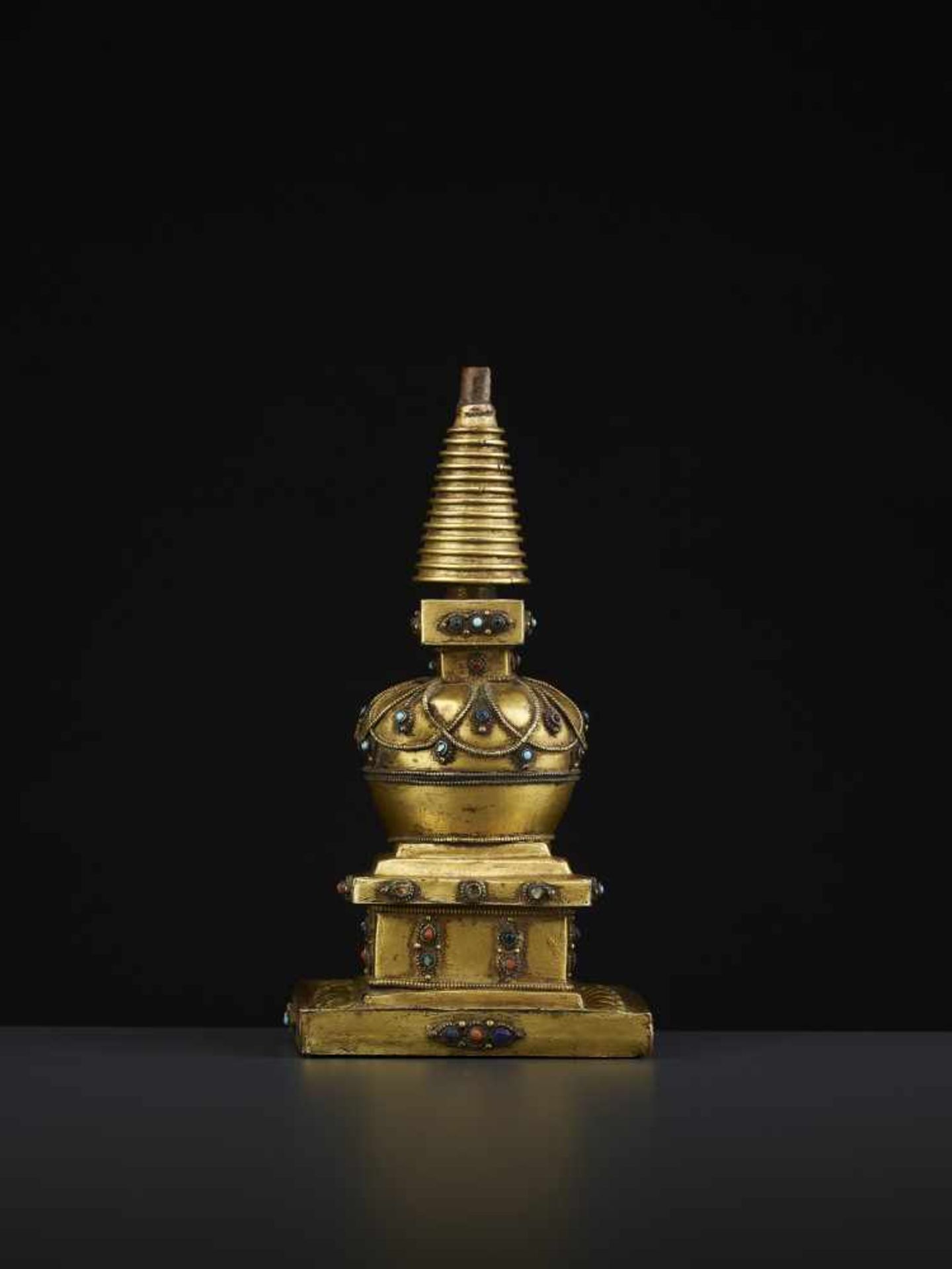 A REPOUSSE STUPA 18TH CENTURYTibet, 18TH to earlier 19TH century. A fire-gilt copper model of a - Image 6 of 11