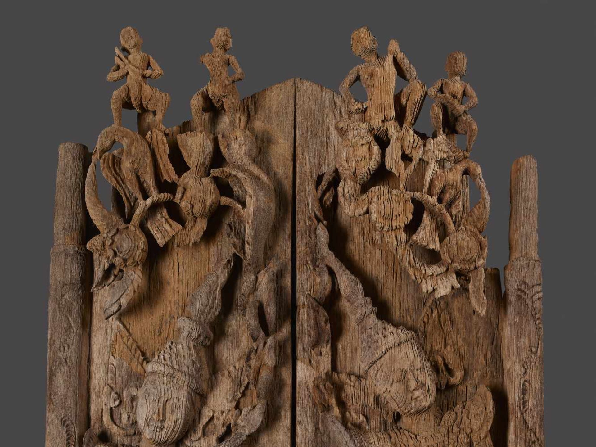 A PAIR OF BURMESE TEMPLE DOORSBurma / Myanmar, 18th - 19th century. Carved teak wood. Each with - Image 2 of 7