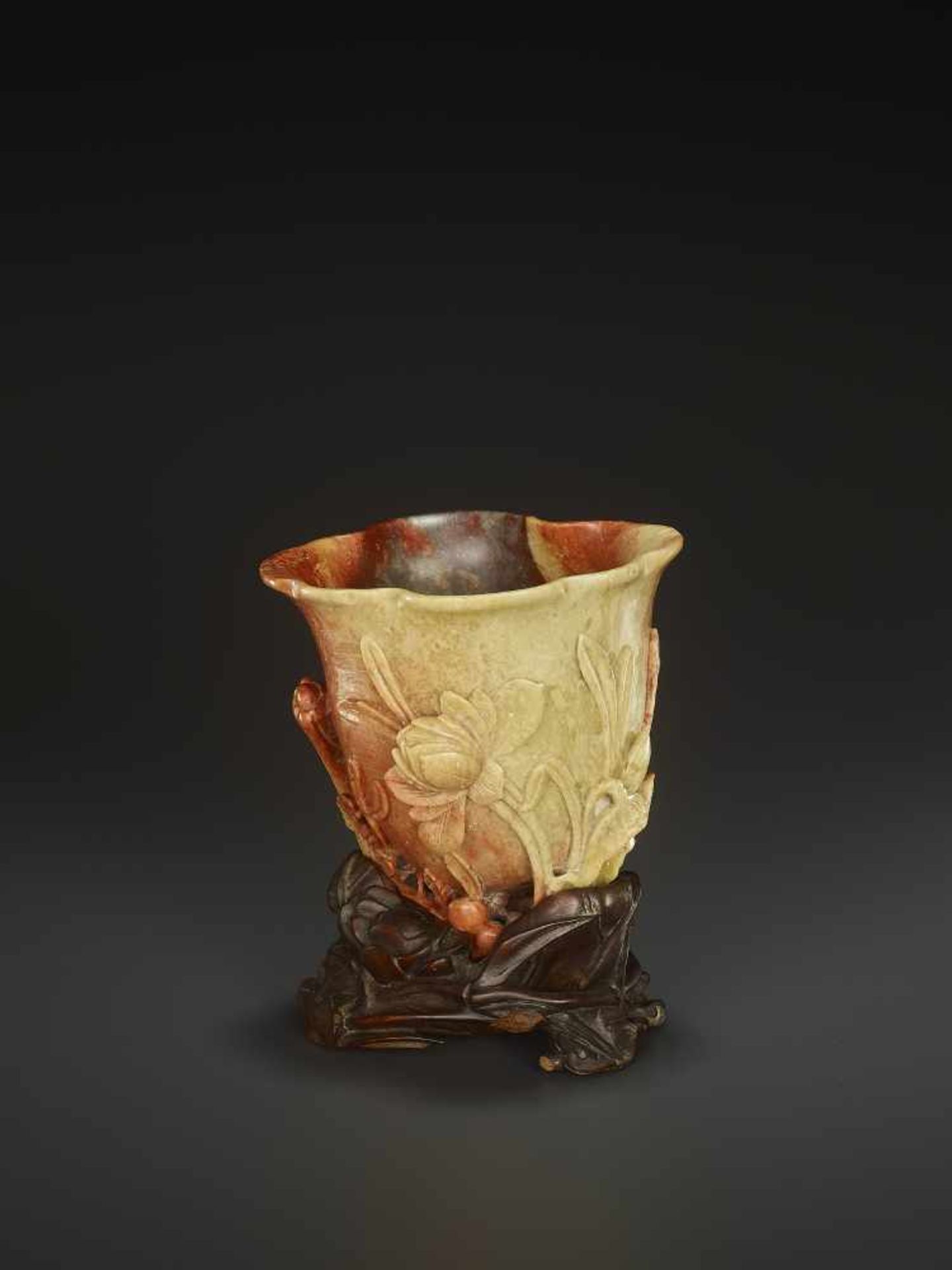 A SOAPSTONE LIBATION CUP, QINGChina, late 18th- mid-19th century. With matching carved hardwood - Image 2 of 7