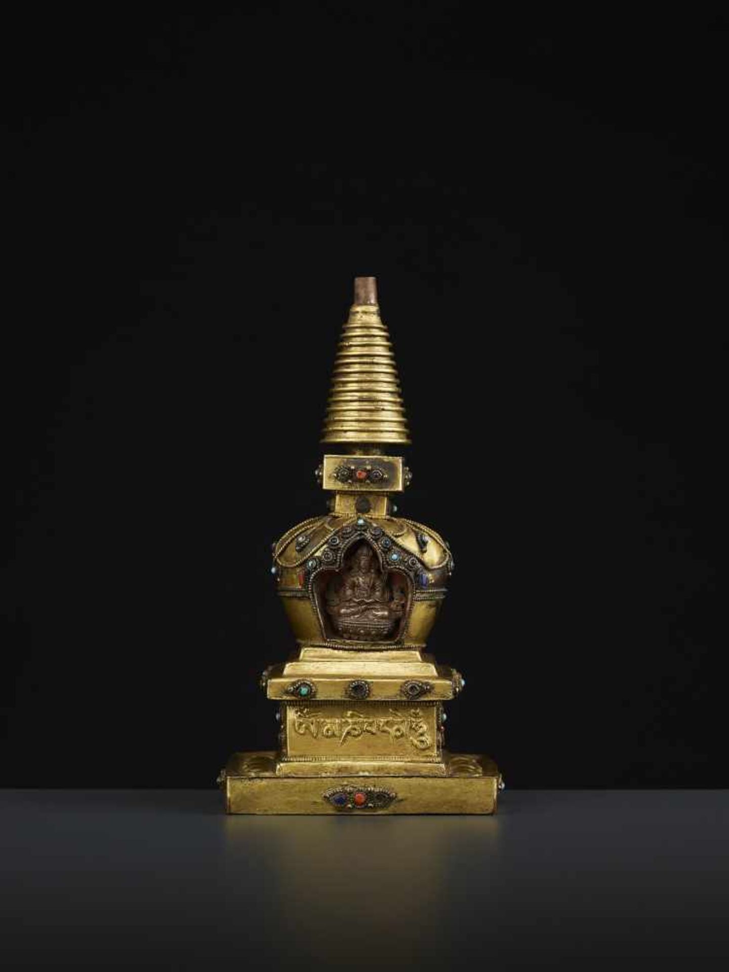 A REPOUSSE STUPA 18TH CENTURYTibet, 18TH to earlier 19TH century. A fire-gilt copper model of a - Image 3 of 11