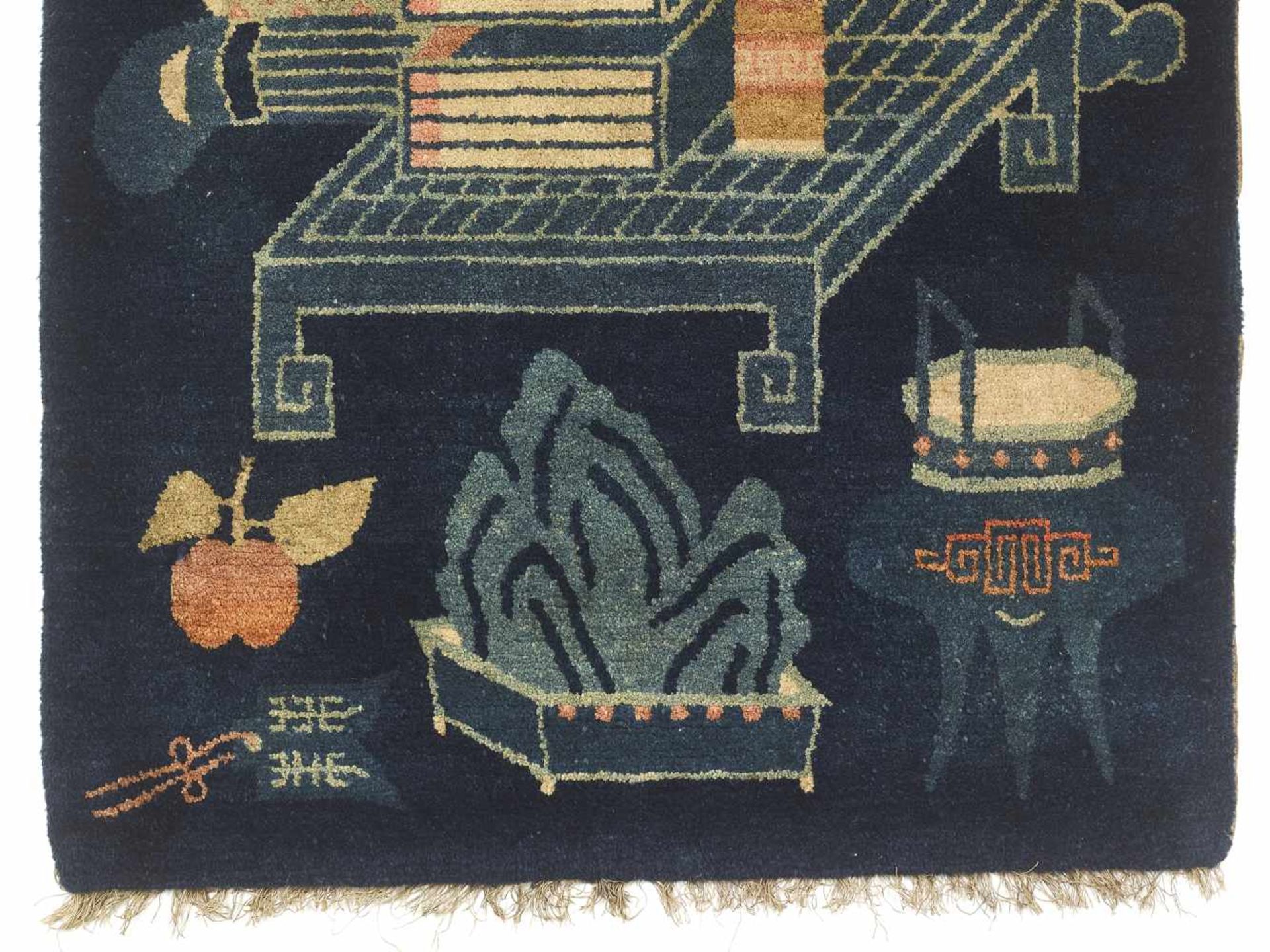 A SMALL NINGXIA RUG, QINGChina, 19th century. Finely woven wool rug with a palace still life showing - Image 3 of 4