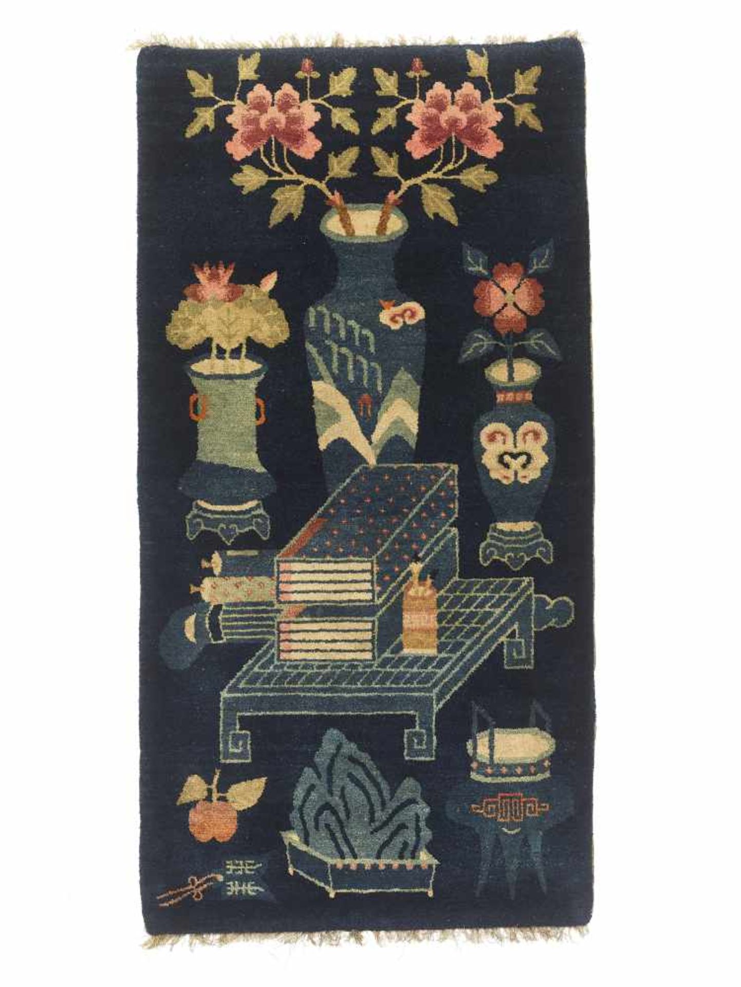 A SMALL NINGXIA RUG, QINGChina, 19th century. Finely woven wool rug with a palace still life showing