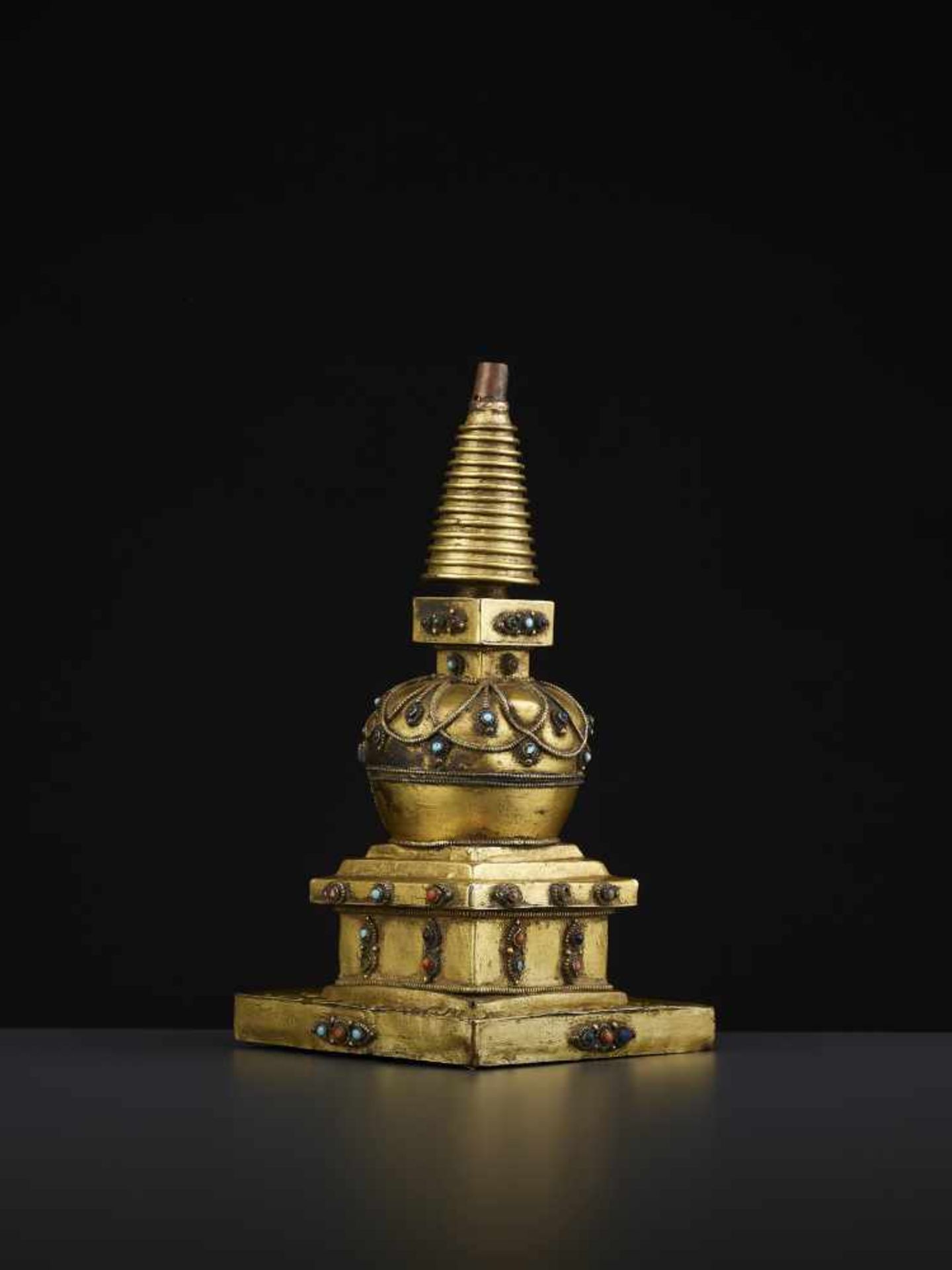 A REPOUSSE STUPA 18TH CENTURYTibet, 18TH to earlier 19TH century. A fire-gilt copper model of a - Image 5 of 11