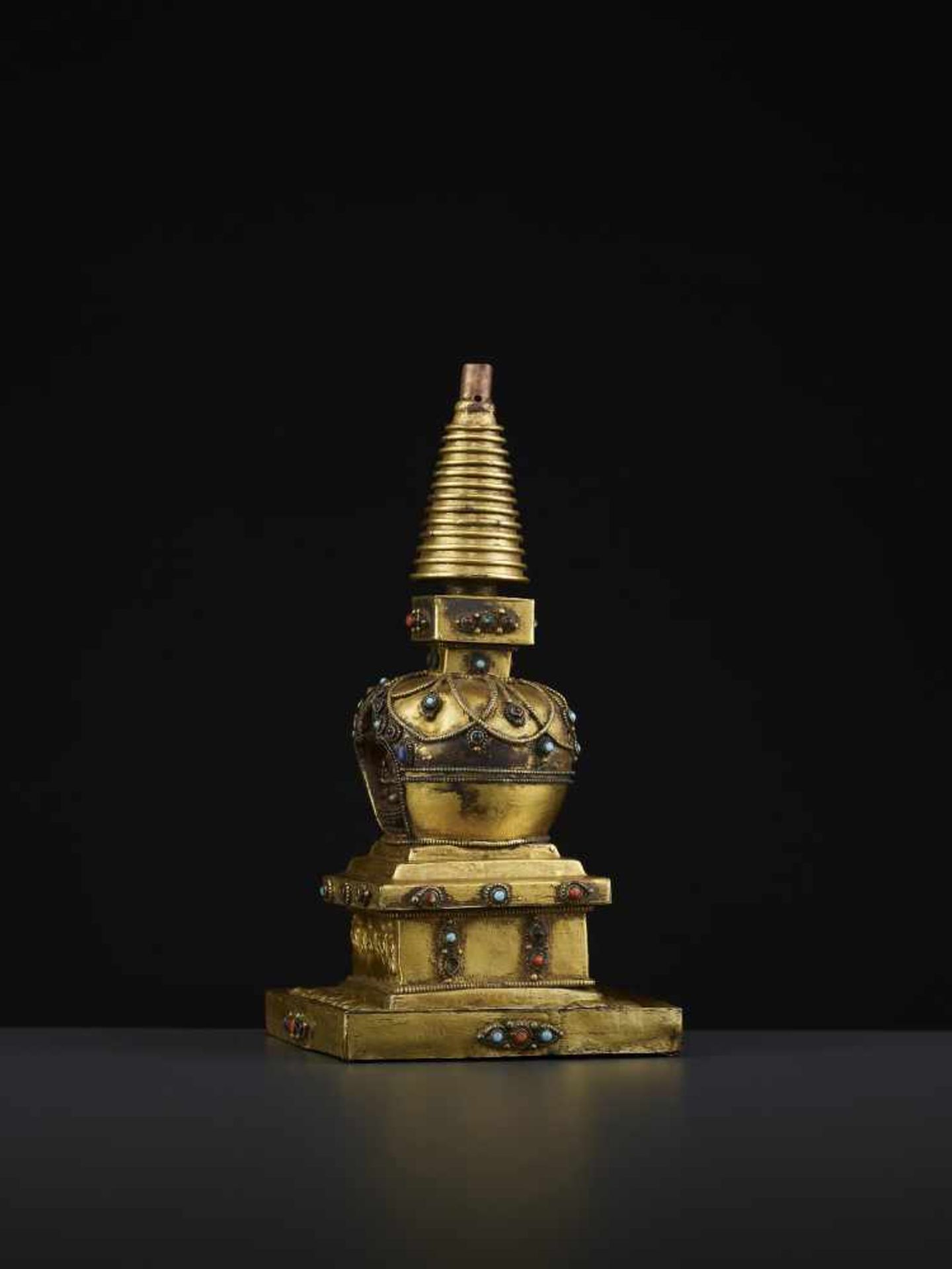 A REPOUSSE STUPA 18TH CENTURYTibet, 18TH to earlier 19TH century. A fire-gilt copper model of a - Image 4 of 11
