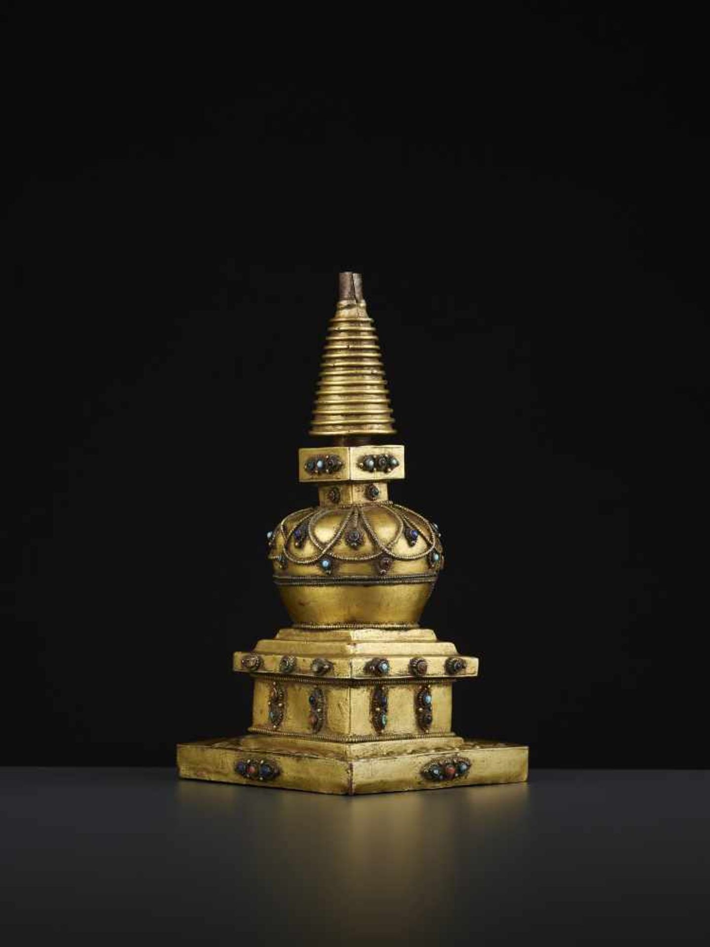 A REPOUSSE STUPA 18TH CENTURYTibet, 18TH to earlier 19TH century. A fire-gilt copper model of a - Image 7 of 11