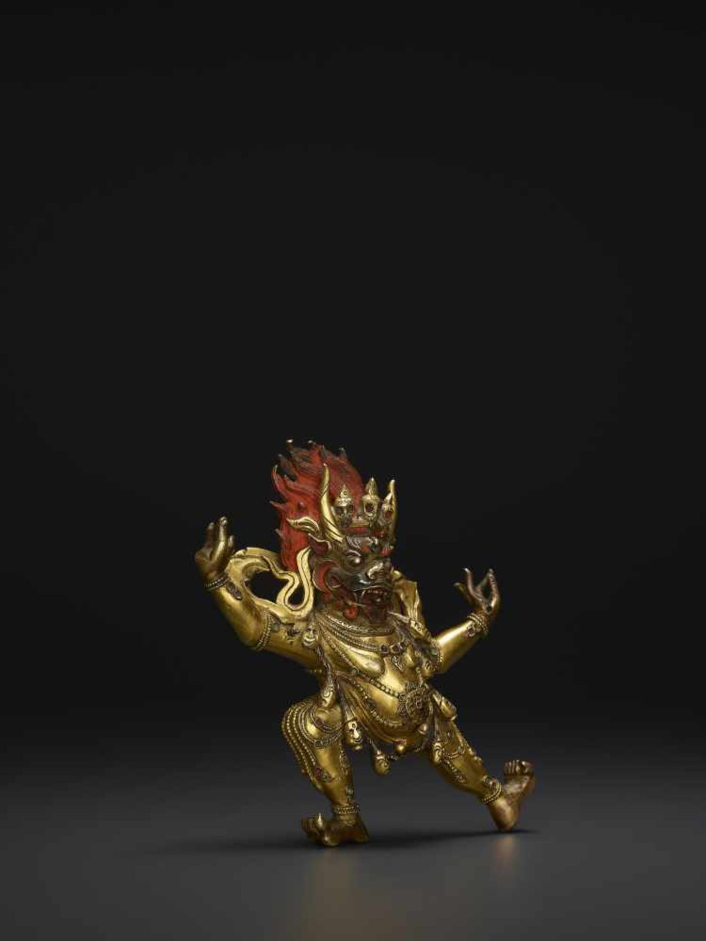 A TIBETAN BRONZE YAMA DHARMARAJA18th century. Fire gilt and incised bronze statue with dramatic cold - Image 2 of 8