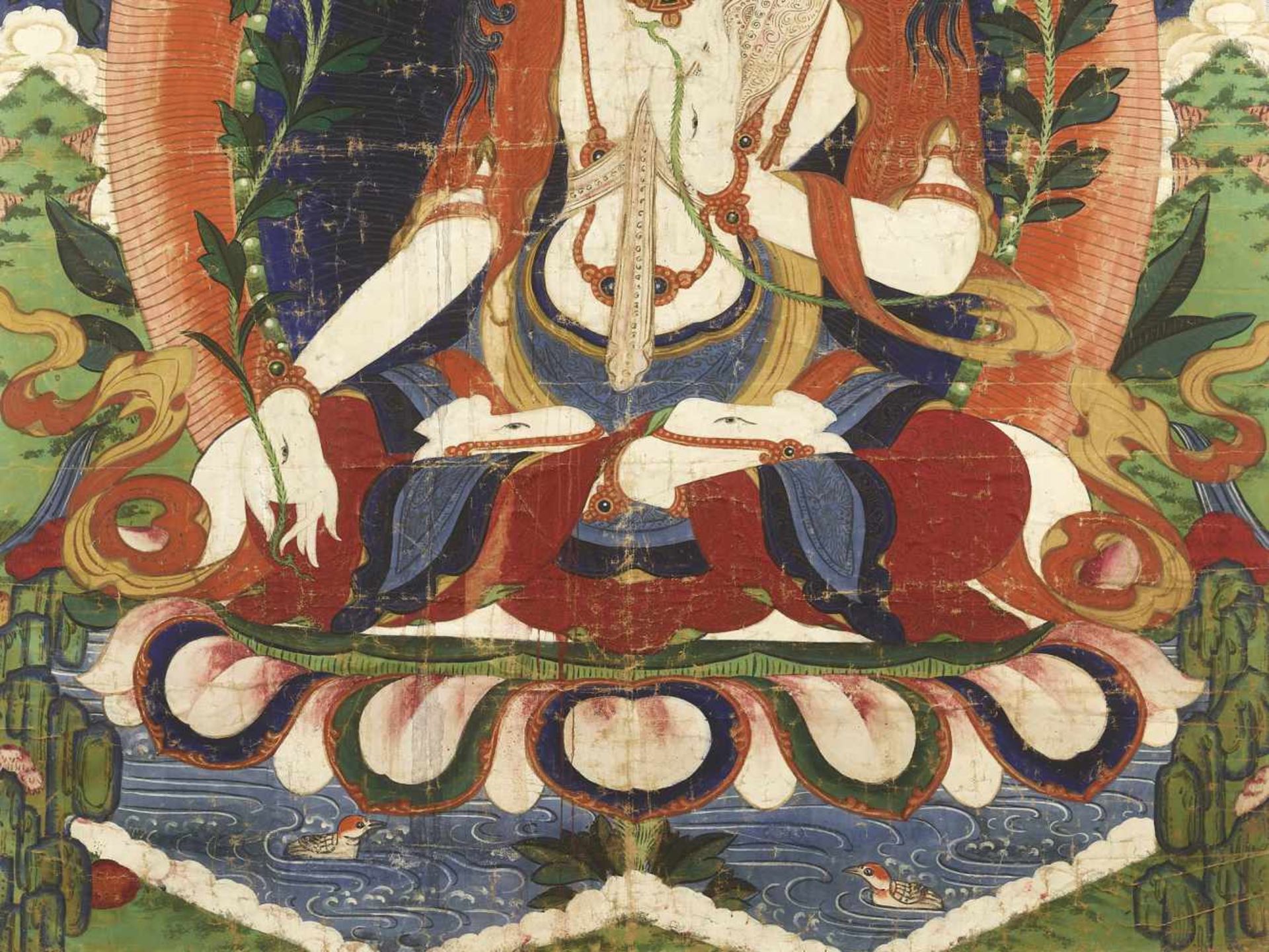 A LARGE SITATARA THANGKA 19TH CENTURYHimalayan. Depiction of the white seven-eyed tara seated on a - Image 3 of 4