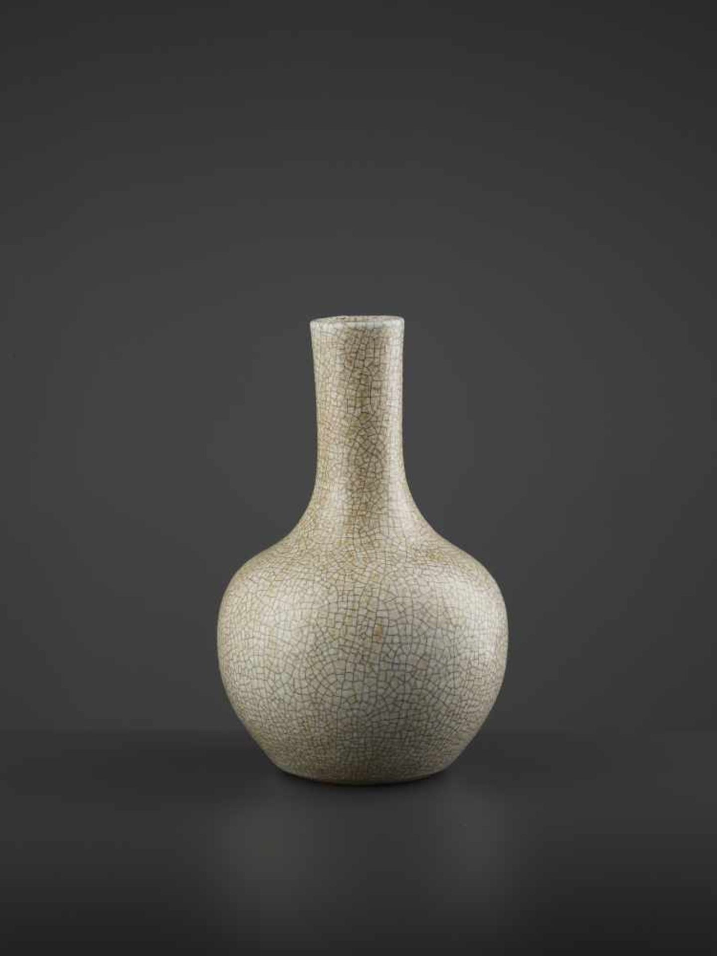 A GE TIANQIUPING, QING DYNASTYChina, 19th century. The heavy vase covered with a grayish white