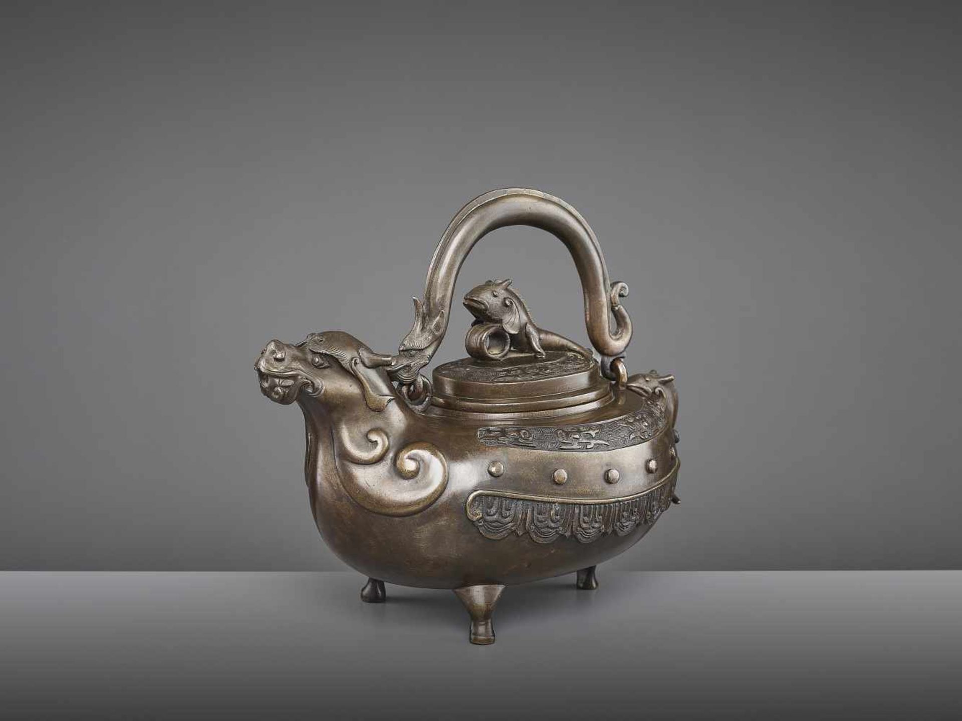 A BRONZE DRAGON EWER, QING China, 18th - 19th century. The lidded tripod vessel with a dragon head - Image 9 of 9