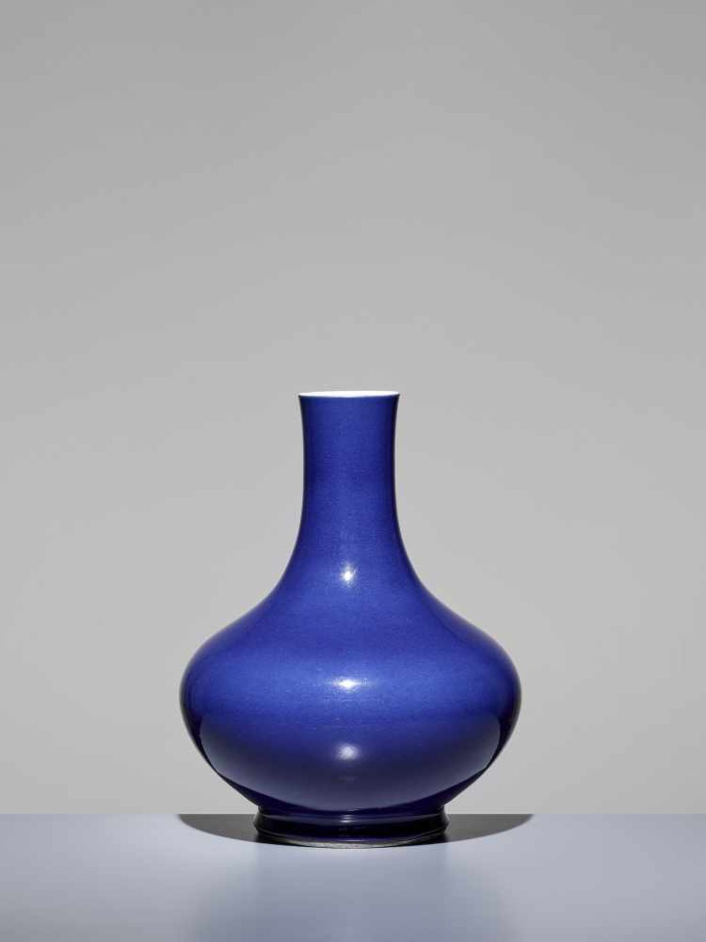 A QIANLONG MARK & PERIOD TIANQIUPINGChina, 1736-1795. The monochrome vase completely covered by an