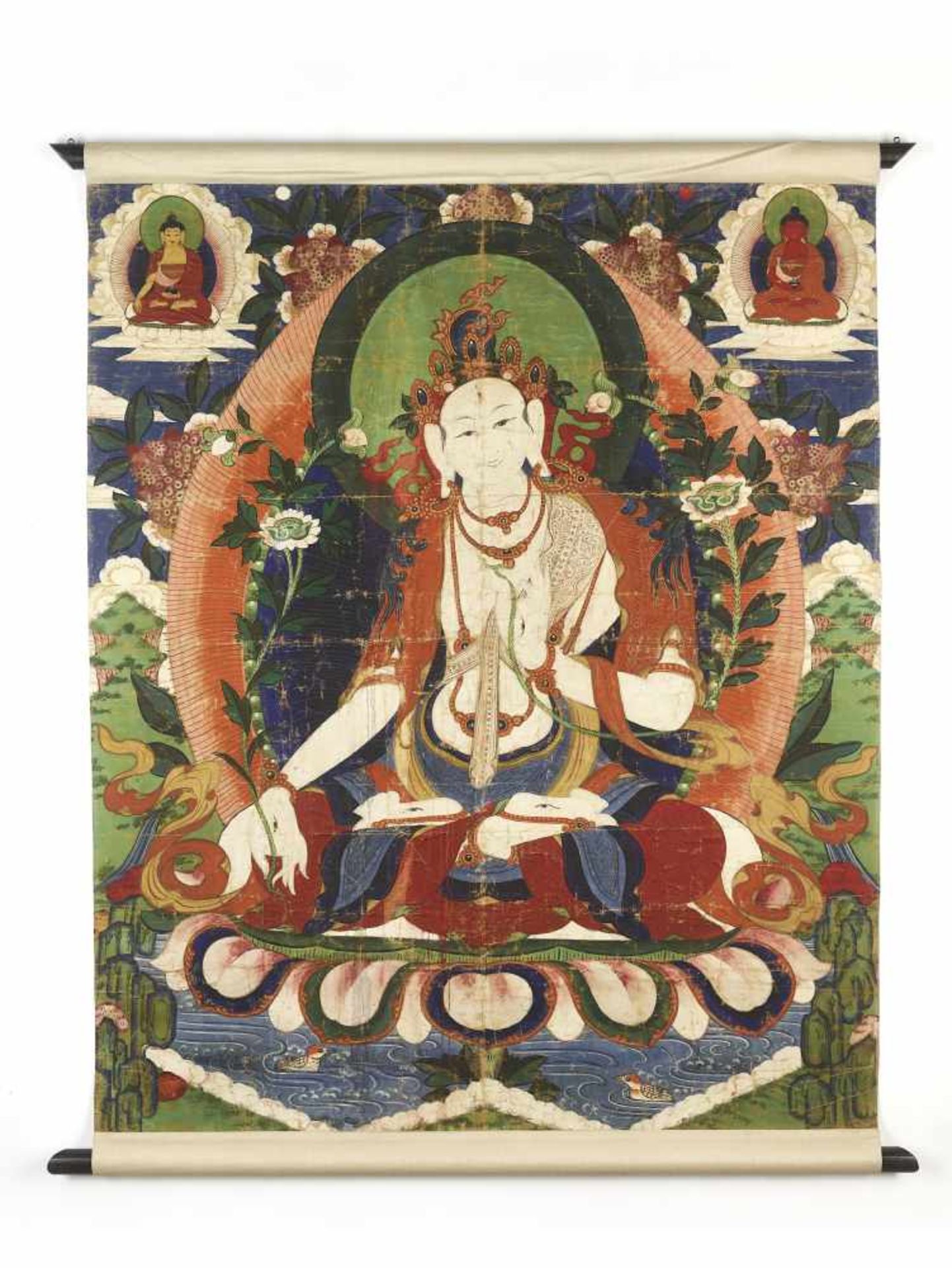 A LARGE SITATARA THANGKA 19TH CENTURYHimalayan. Depiction of the white seven-eyed tara seated on a