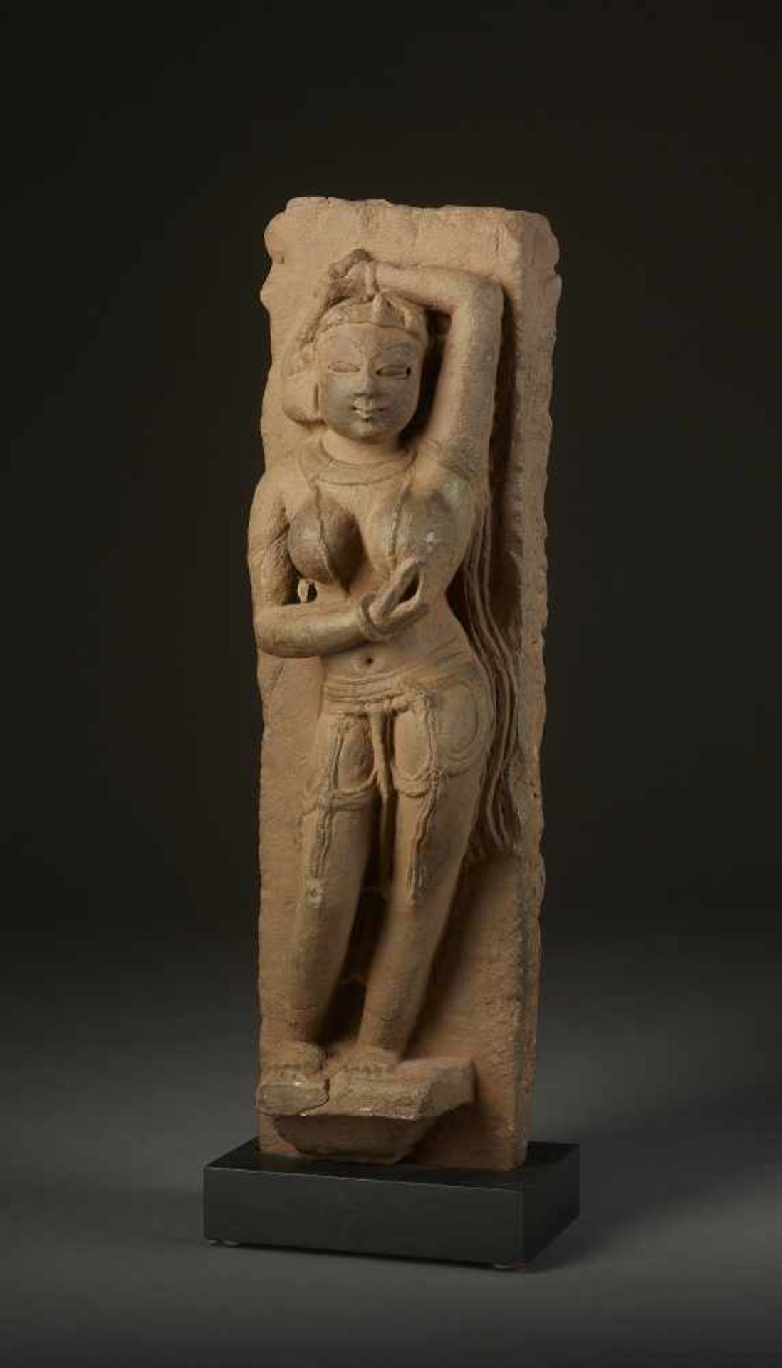 A SANDSTONE YAKSHINI 10th CENTURYCentral India, 10th - 11th century. The pillar fragment carved in