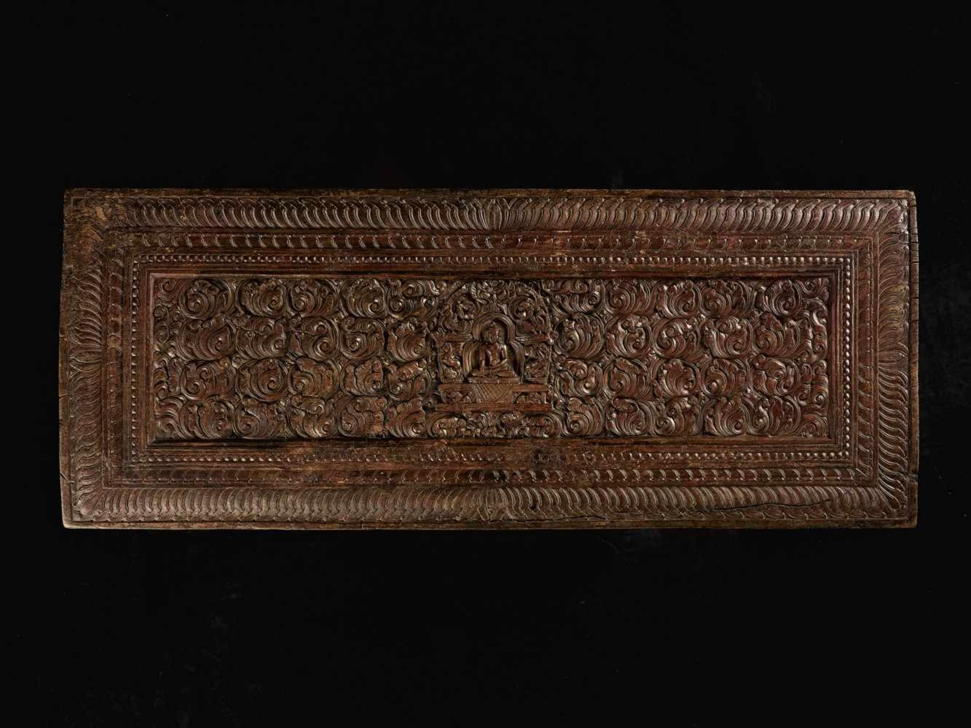 A RARE MANUSCRIPT COVER 17TH CENTURYTibet, 17th- earlier 18th century. The finely carved and