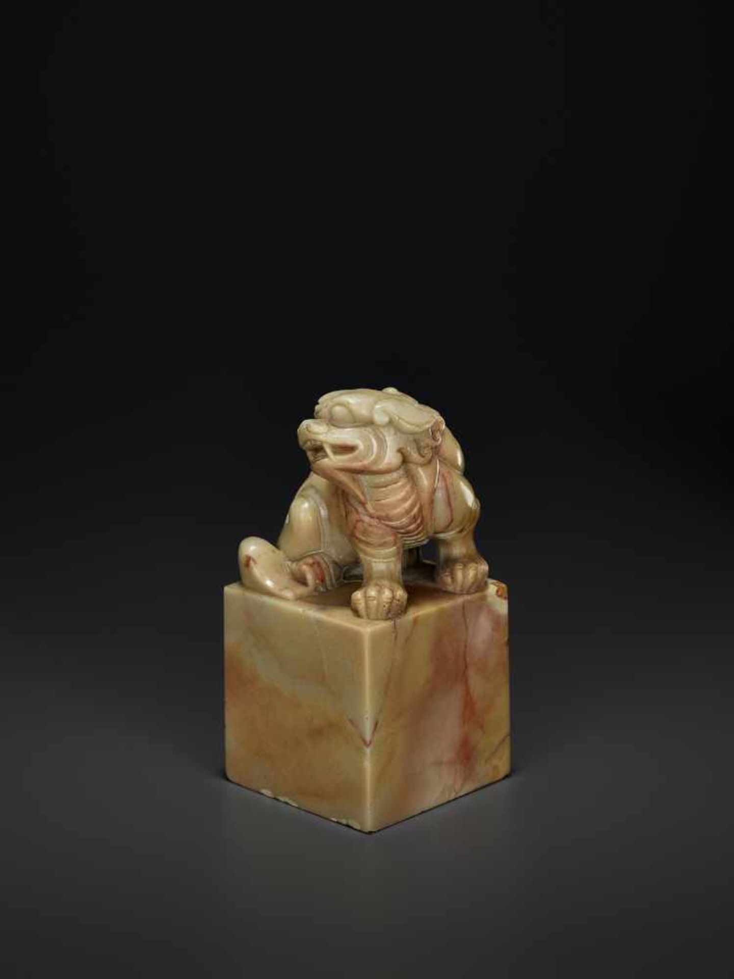 A LARGE SOAPSTONE SEAL, QINGChina, 1780-1860. Openwork carving with a Buddhist lion sitting on a