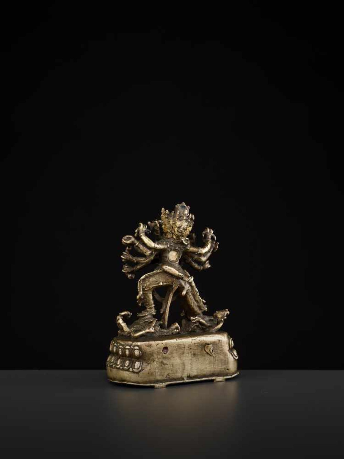 A CAKRASAMVARA BRONZE 17TH CENTURY Nepal. The four-headed and twelve-armed Cakrasamvara entangled by - Image 9 of 15