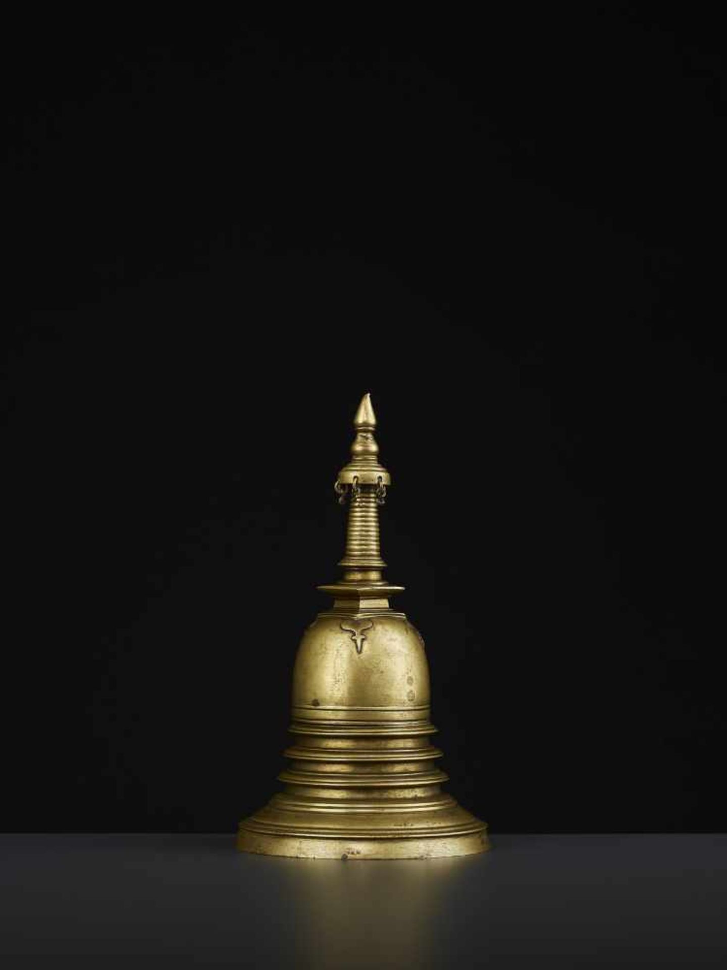 A 19TH CENTURY RELIQUARY STUPA South East Asia, 19th century. The bronze stupa with its originally - Image 3 of 8