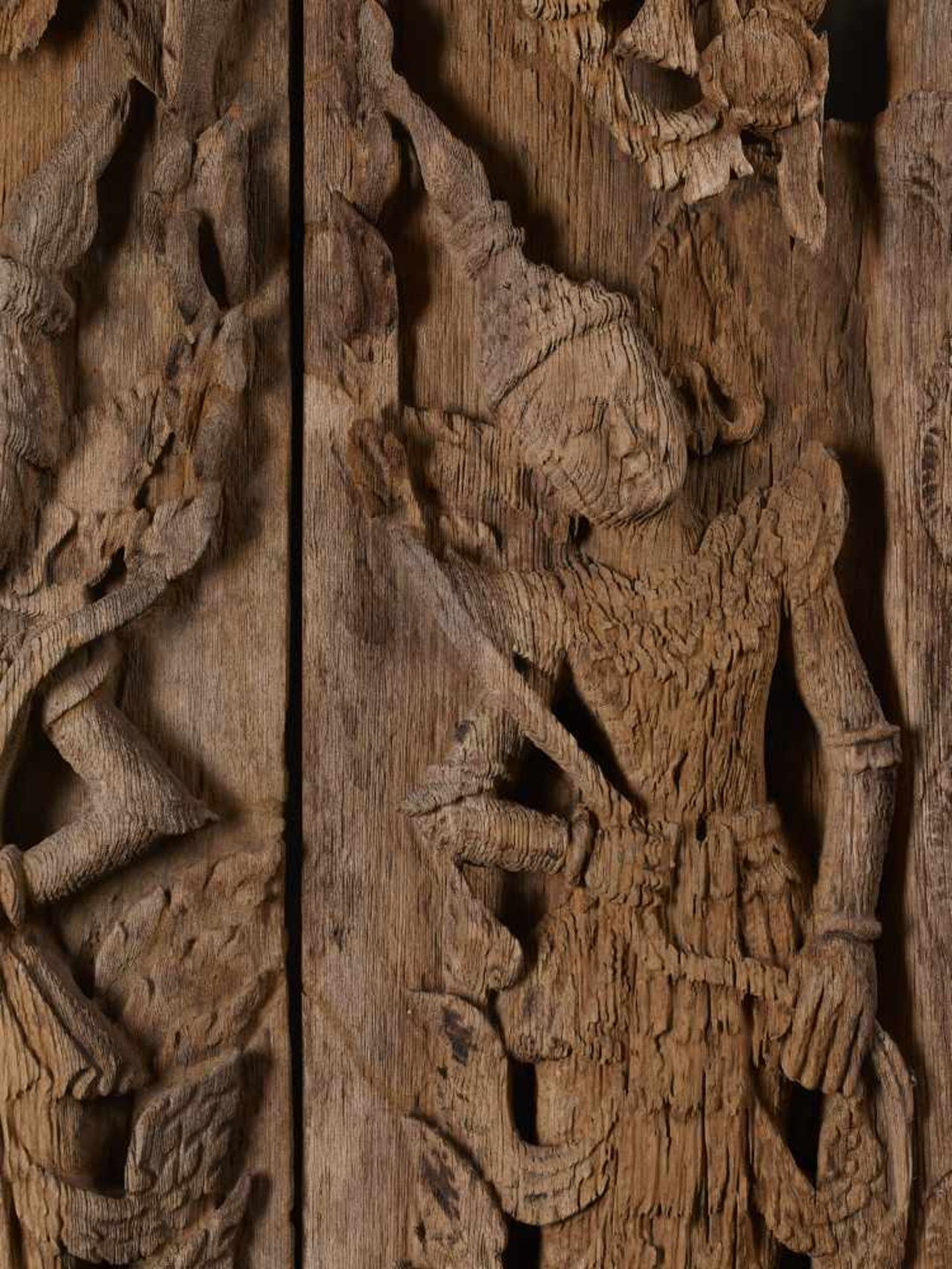 A PAIR OF BURMESE TEMPLE DOORSBurma / Myanmar, 18th - 19th century. Carved teak wood. Each with - Image 5 of 7