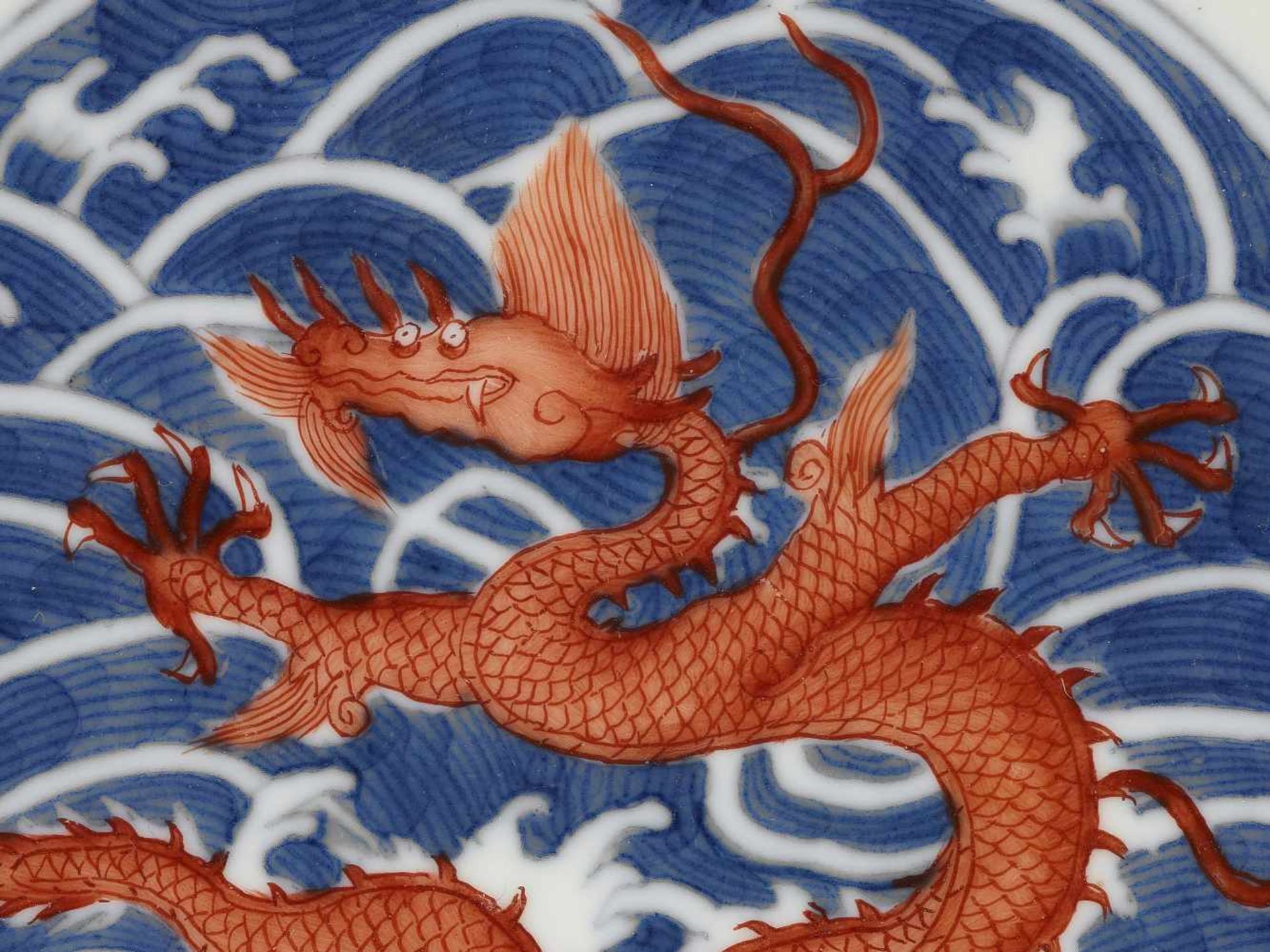 A DAOGUANG MARK & PERIOD DRAGON DISHChina, 1821-1850. Porcelain painted in iron red and underglaze- - Image 7 of 10
