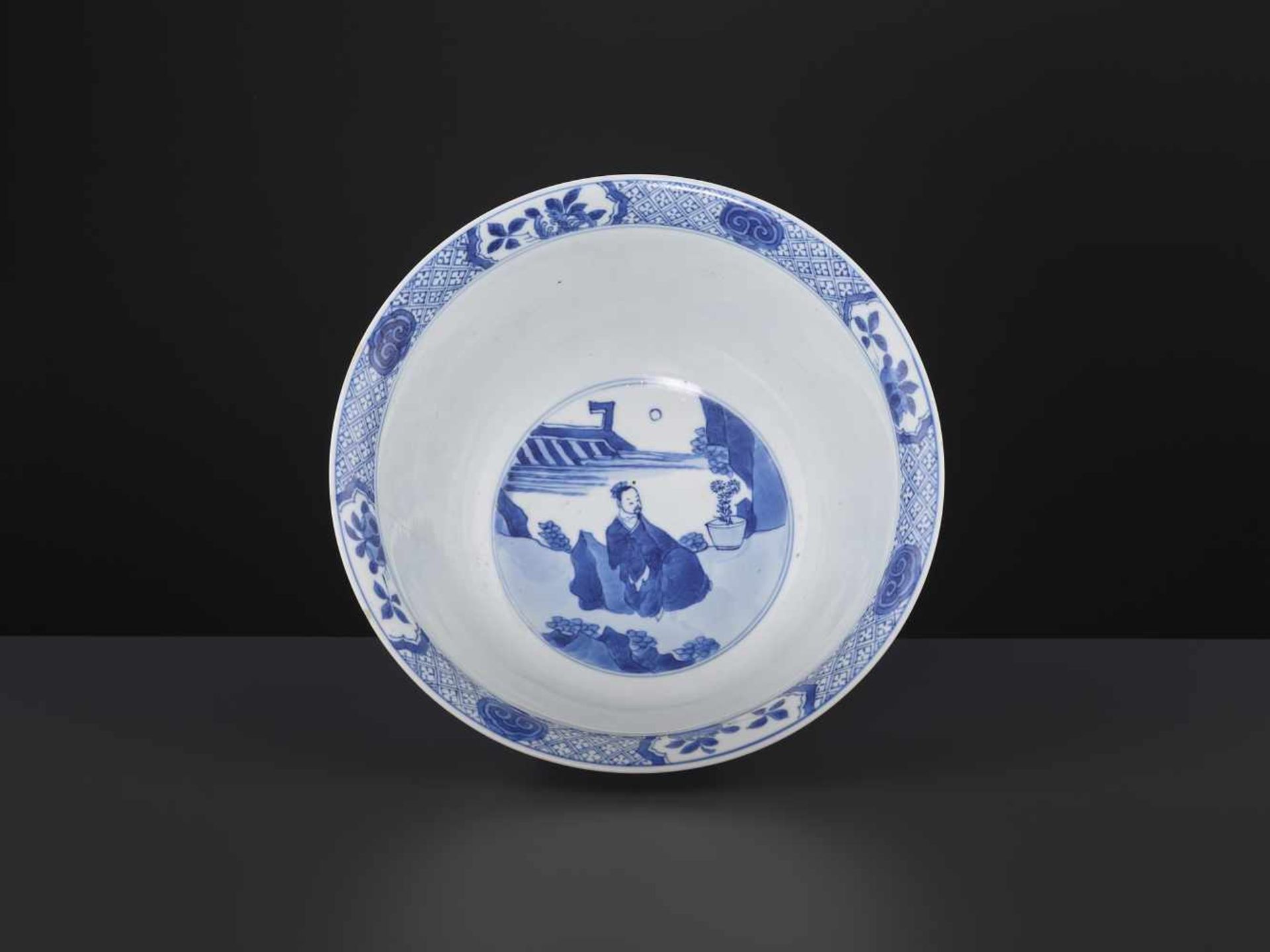 A KANGXI PERIOD WEIQI PLAYER BOWLChina, 1662-1722. Skillfully painted in striking cobalt-blue with - Image 7 of 11